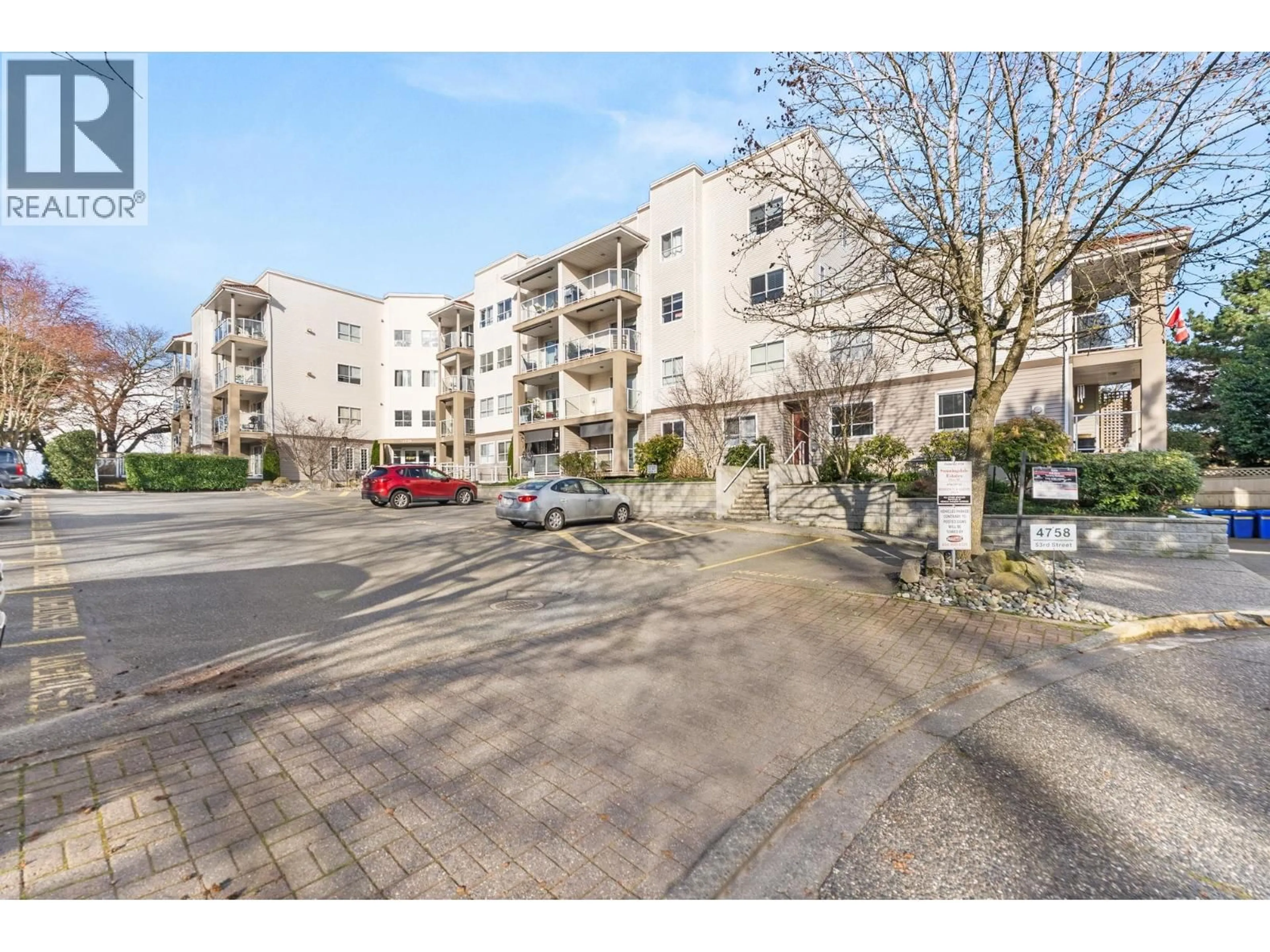 A pic from outside/outdoor area/front of a property/back of a property/a pic from drone, street for 403 - 4758 53 STREET, Delta British Columbia V4K2Z1