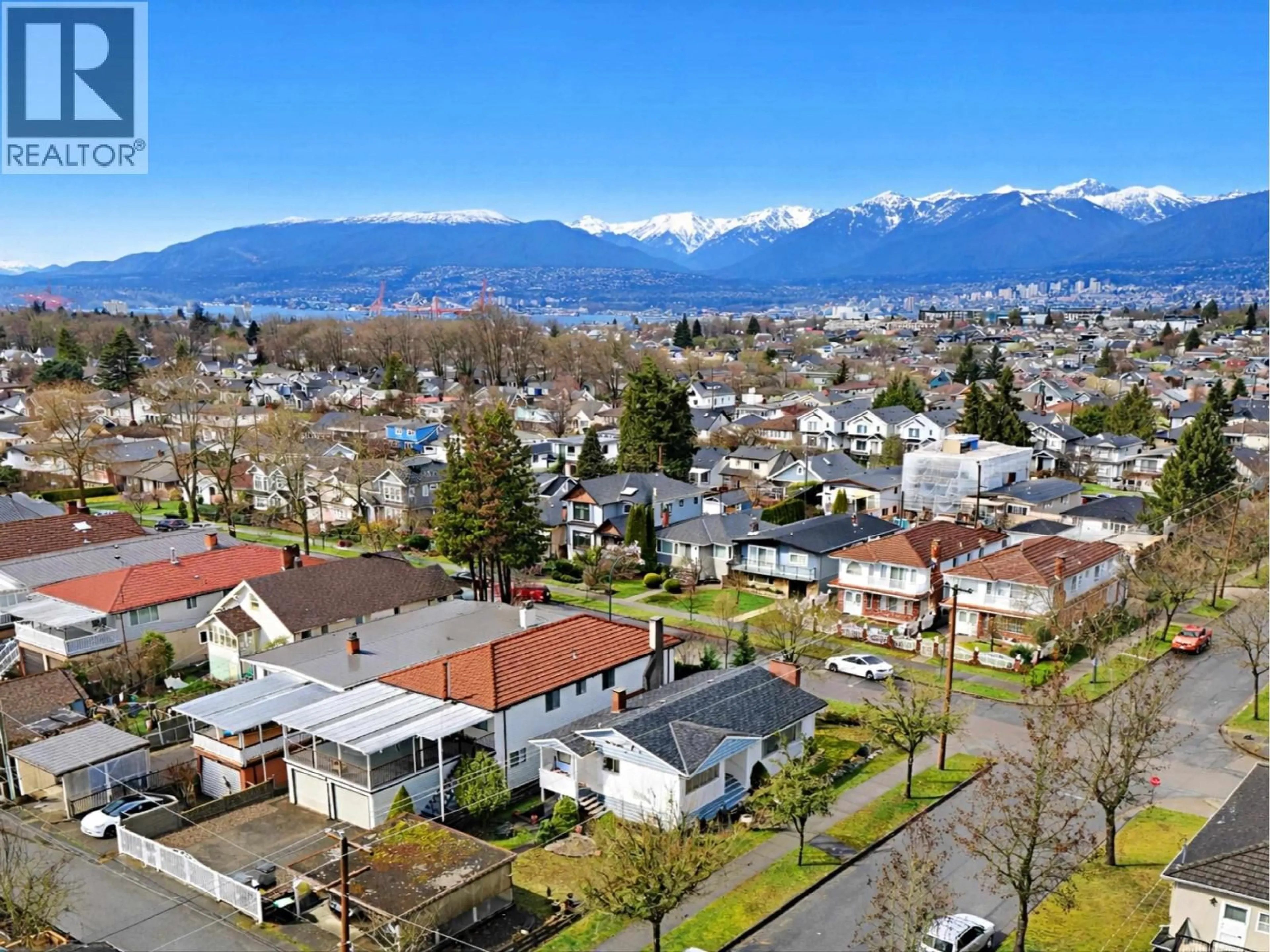 A pic from outside/outdoor area/front of a property/back of a property/a pic from drone, mountain view for 1415 KASLO STREET, Vancouver British Columbia V5K3Z8