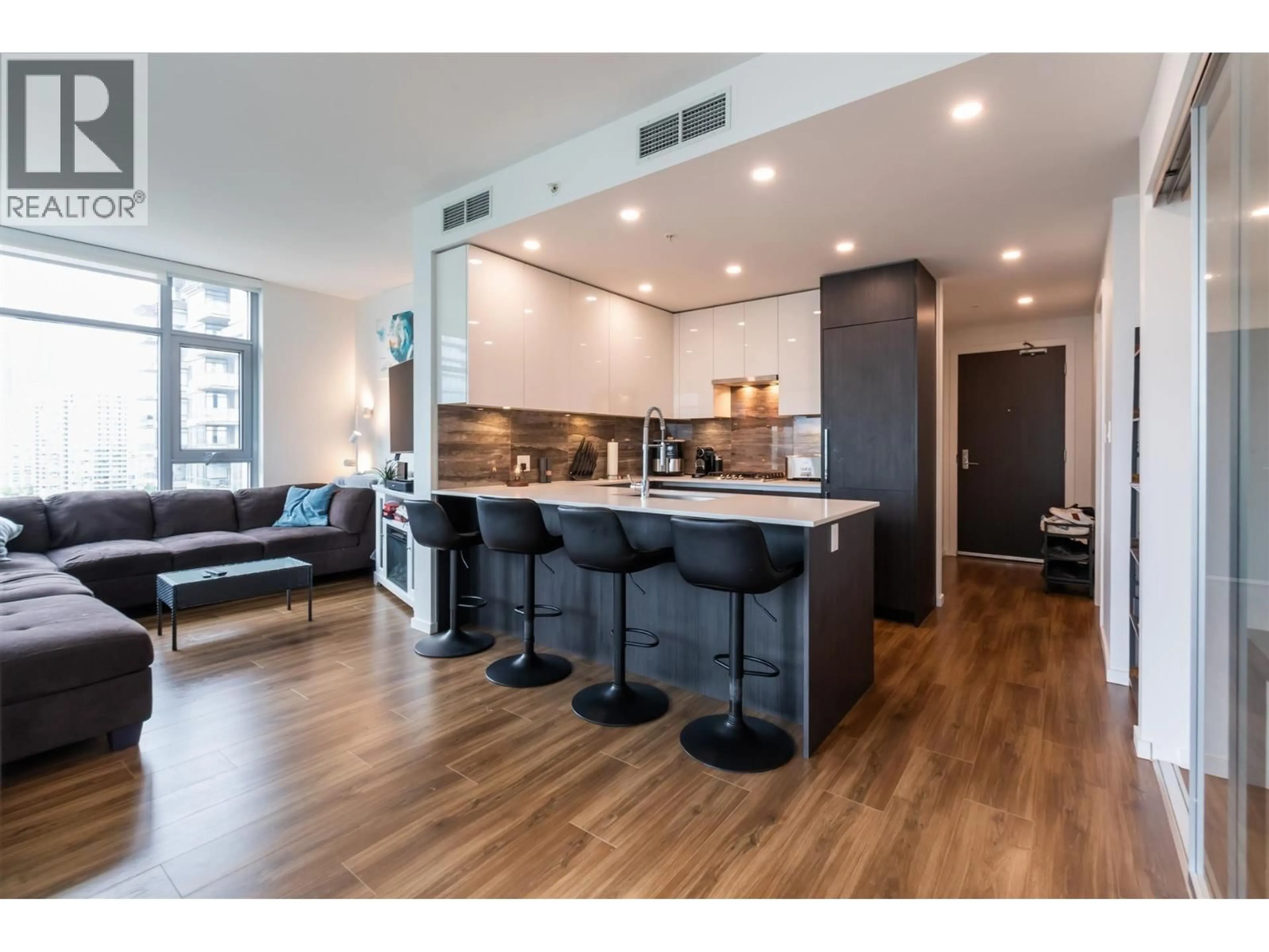 Open concept kitchen, wood/laminate floor for 1801 - 1888 GILMORE AVENUE, Burnaby British Columbia V5C0L2