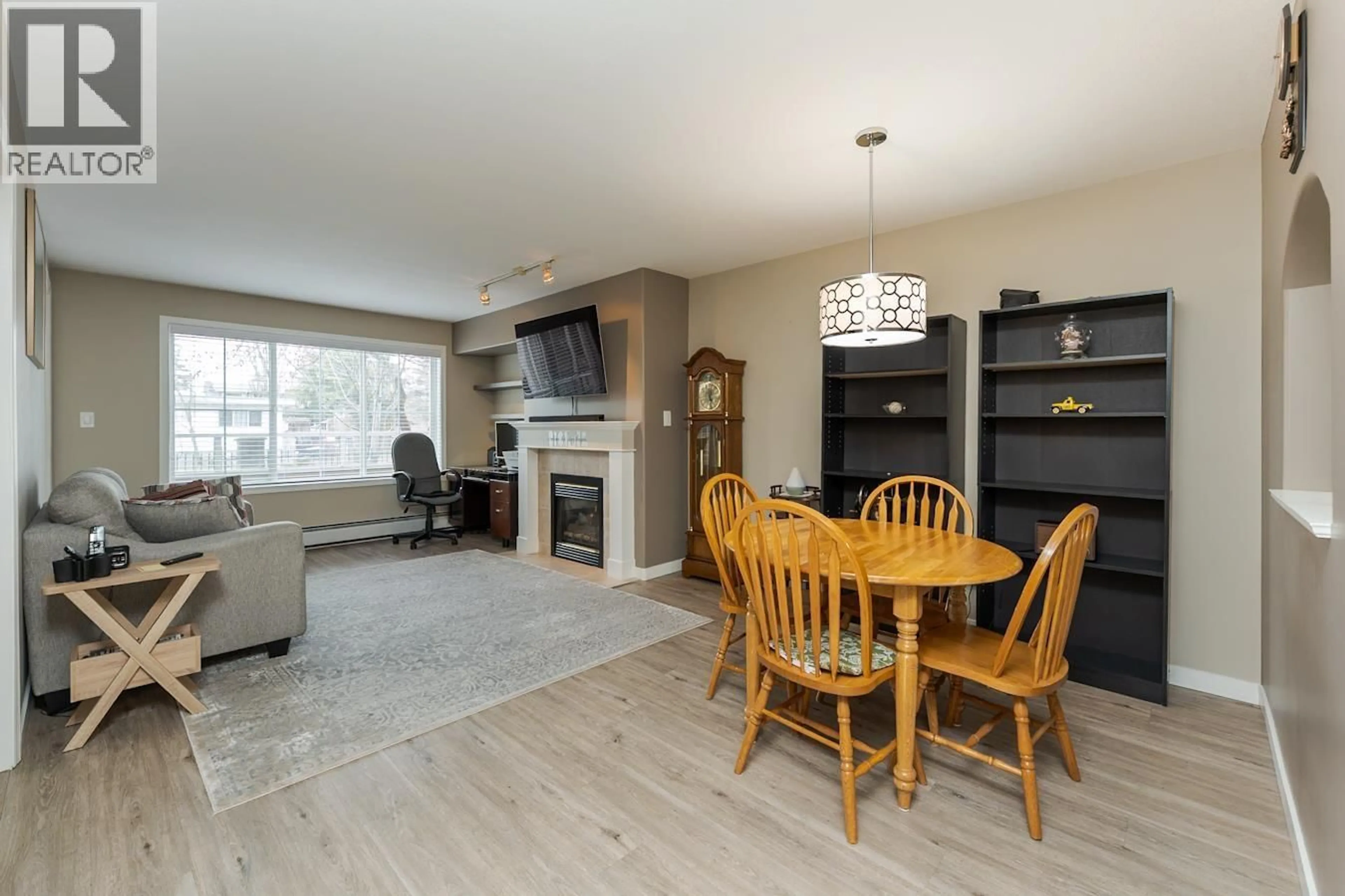 Living room with furniture, wood/laminate floor for 108 - 2055 INGLEDEW STREET, Prince George British Columbia V2L5S1