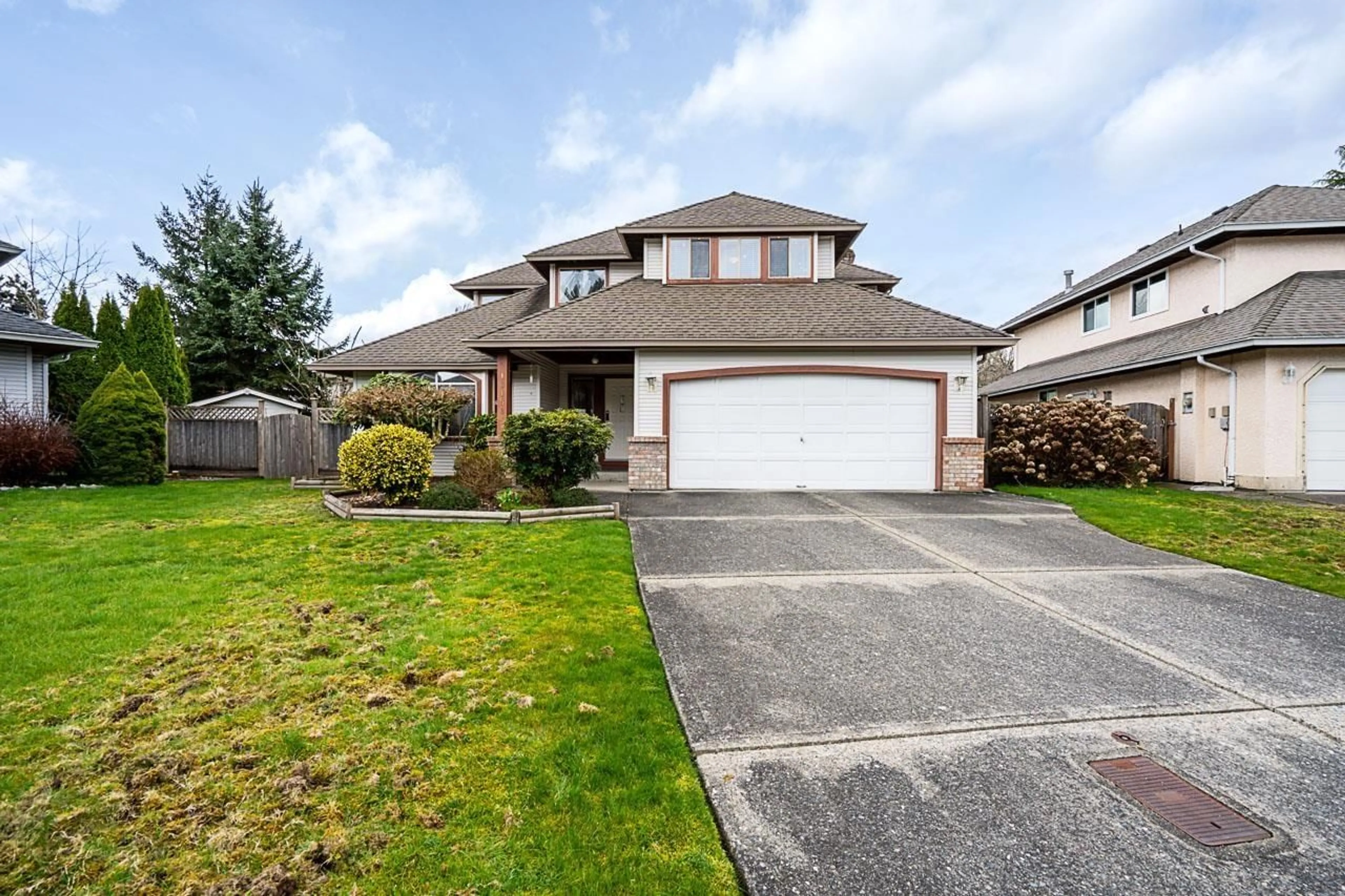 Home with vinyl exterior material, street for 16156 94A AVENUE, Surrey British Columbia V4N3A2