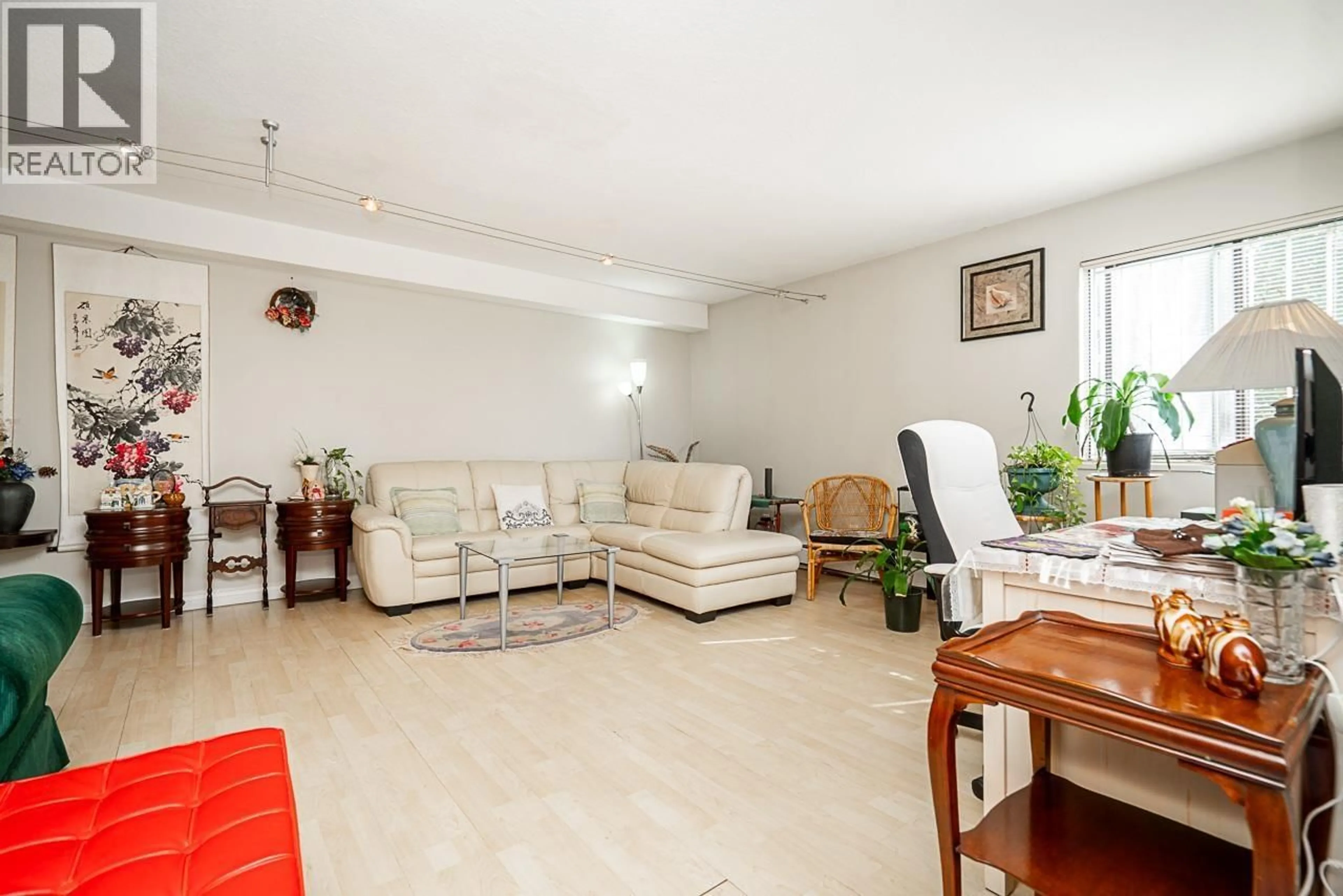 Living room with furniture, unknown for 5150 HASTINGS STREET, Burnaby British Columbia V5B1P6