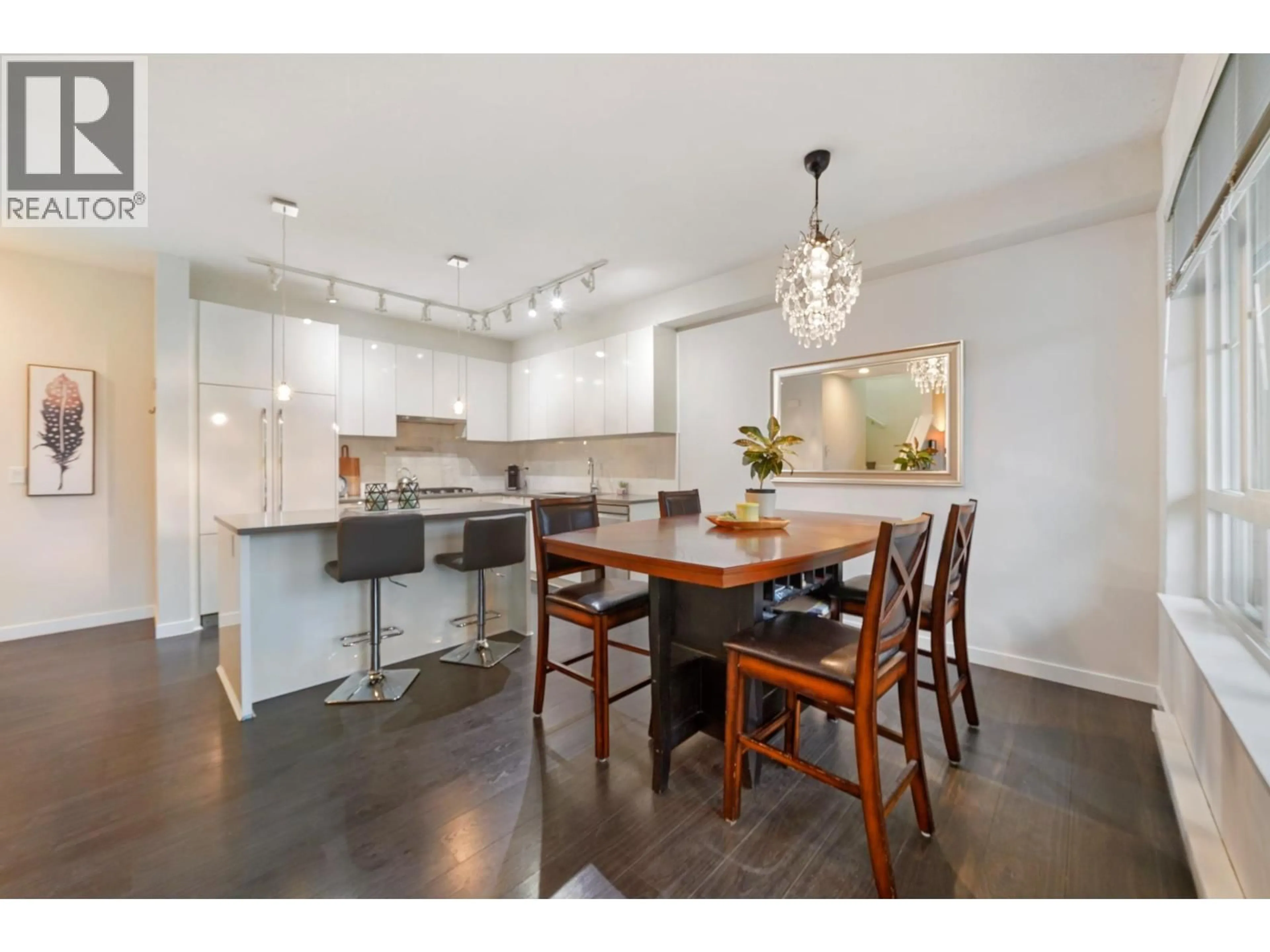 Open concept kitchen, wood/laminate floor for 17 - 5510 ADMIRAL WAY, Delta British Columbia V4K0C3