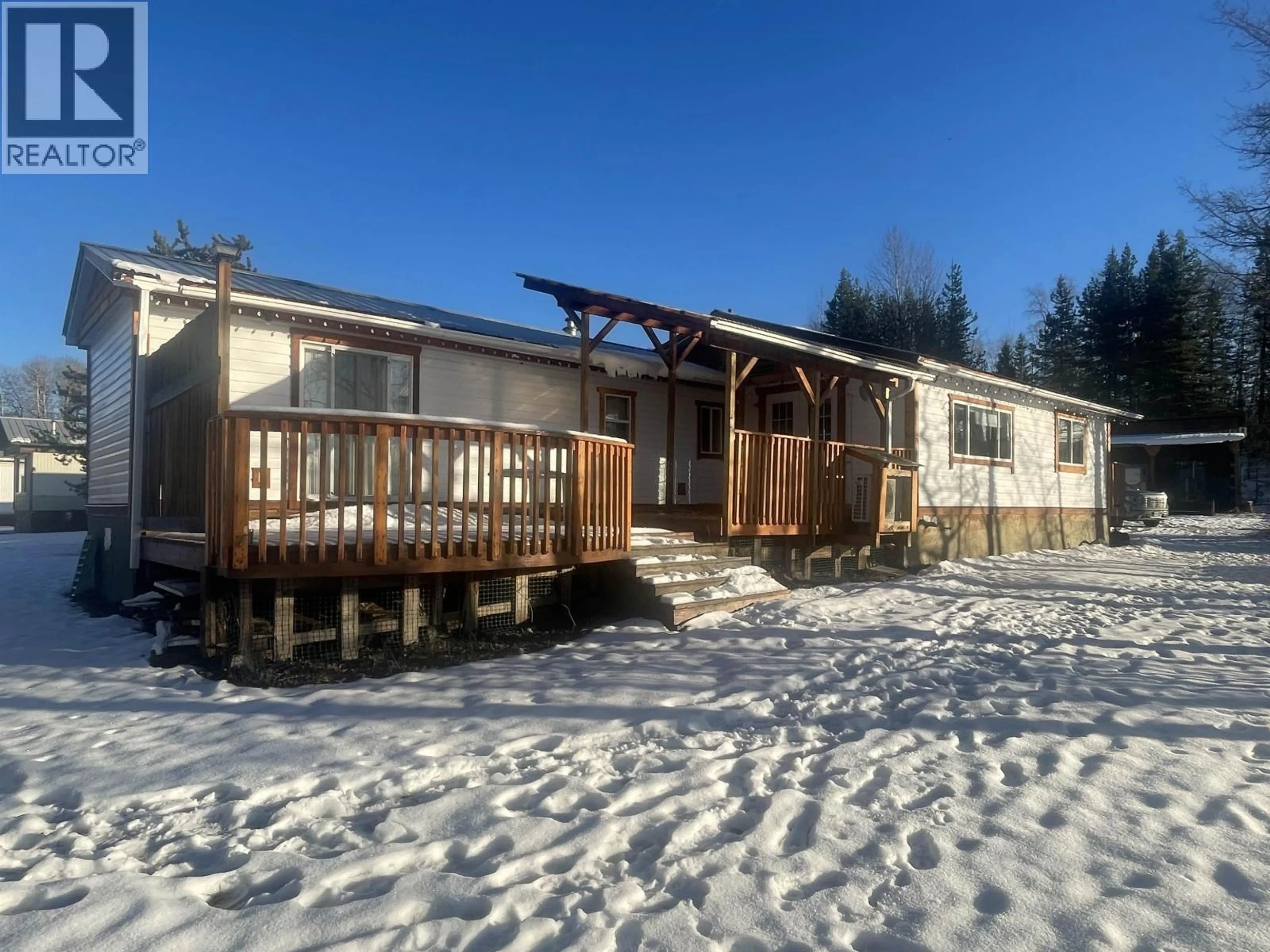 A pic from outside/outdoor area/front of a property/back of a property/a pic from drone, building for 7 - 12601 16 HIGHWAY, Telkwa British Columbia V0J2X2