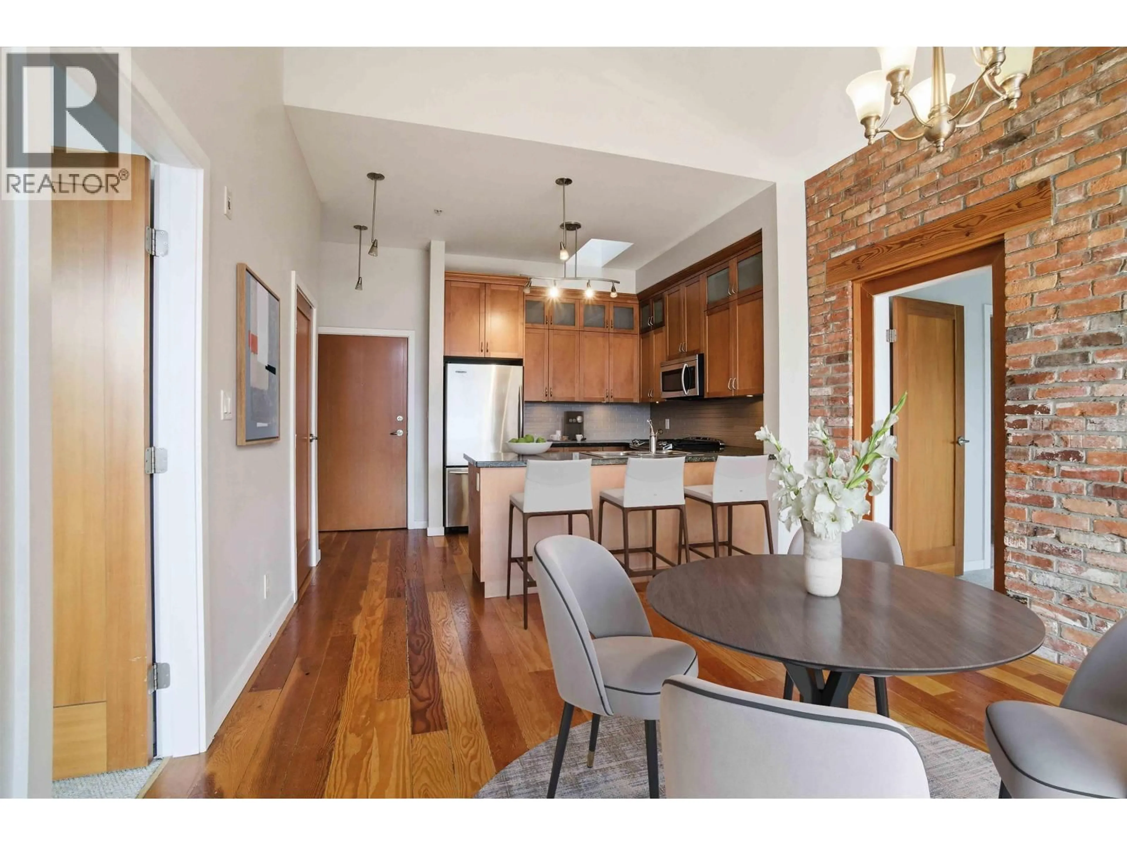Open concept kitchen, wood/laminate floor for 407 - 250 SALTER STREET, New Westminster British Columbia V3M0B7