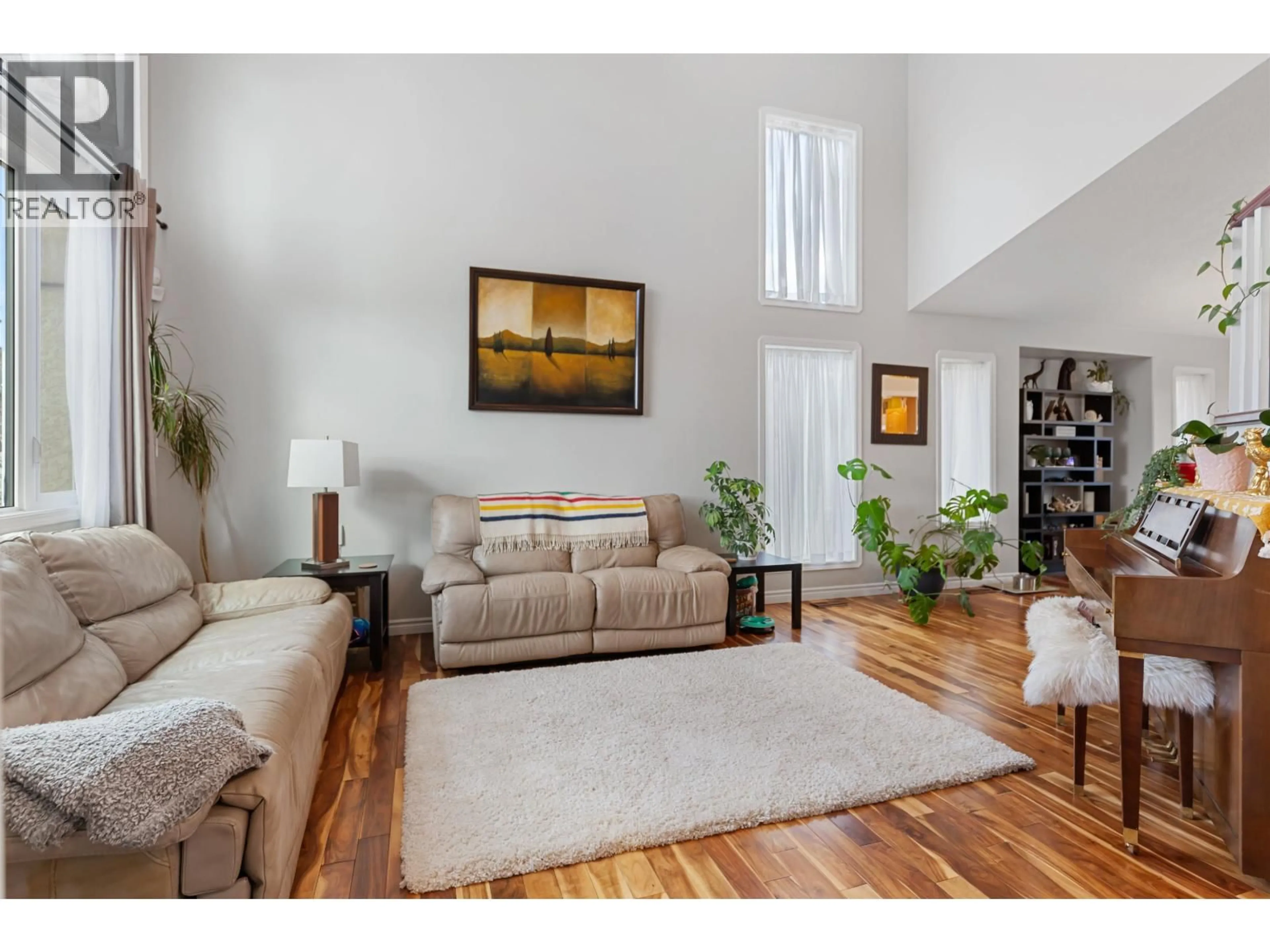 Living room with furniture, wood/laminate floor for 6724 WESTMOUNT DRIVE, Prince George British Columbia V2N6R3