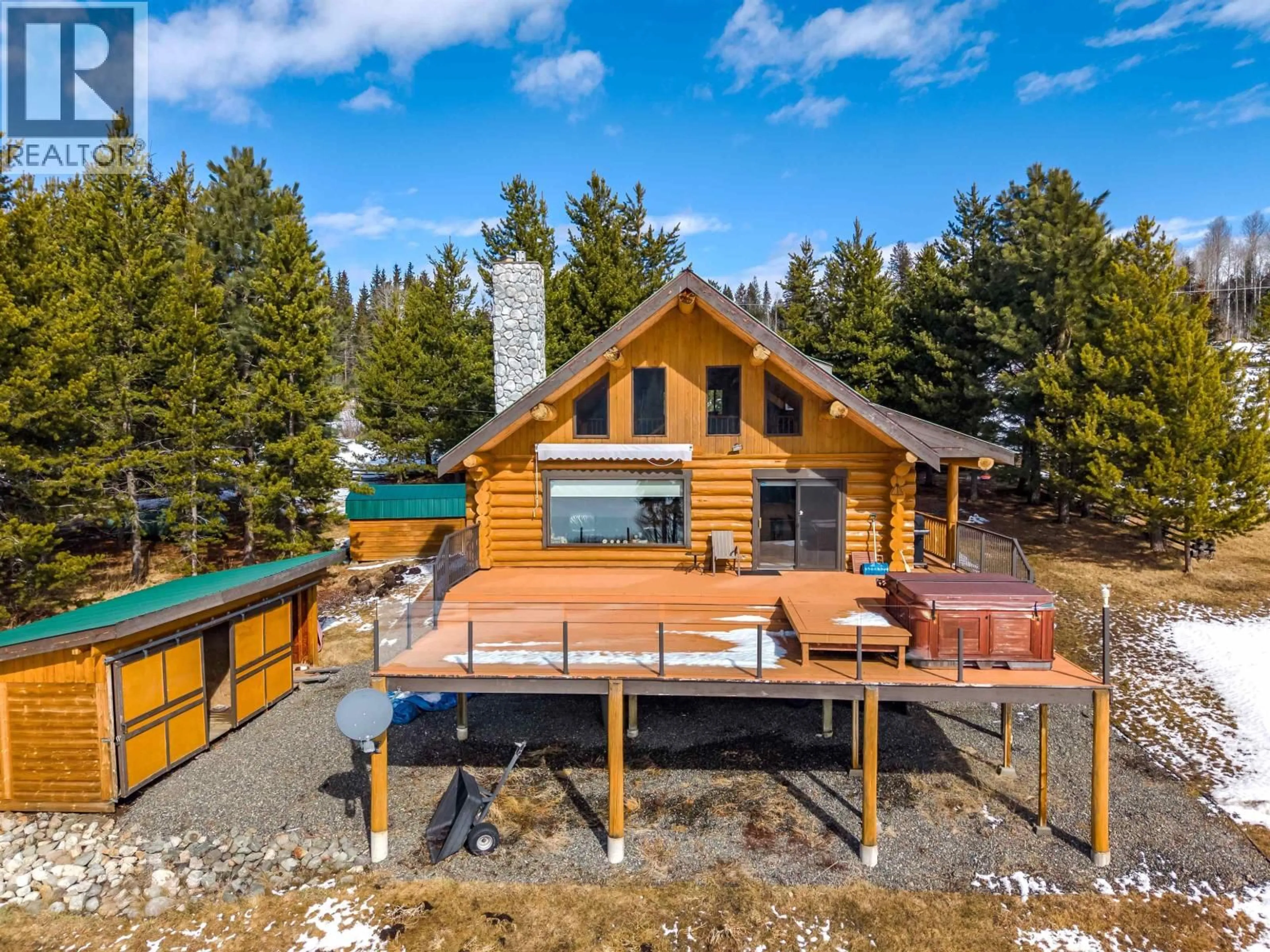 A pic from outside/outdoor area/front of a property/back of a property/a pic from drone, water/lake/river/ocean view for 7540 MCCARTHY ROAD, Bridge Lake British Columbia V0K1E0