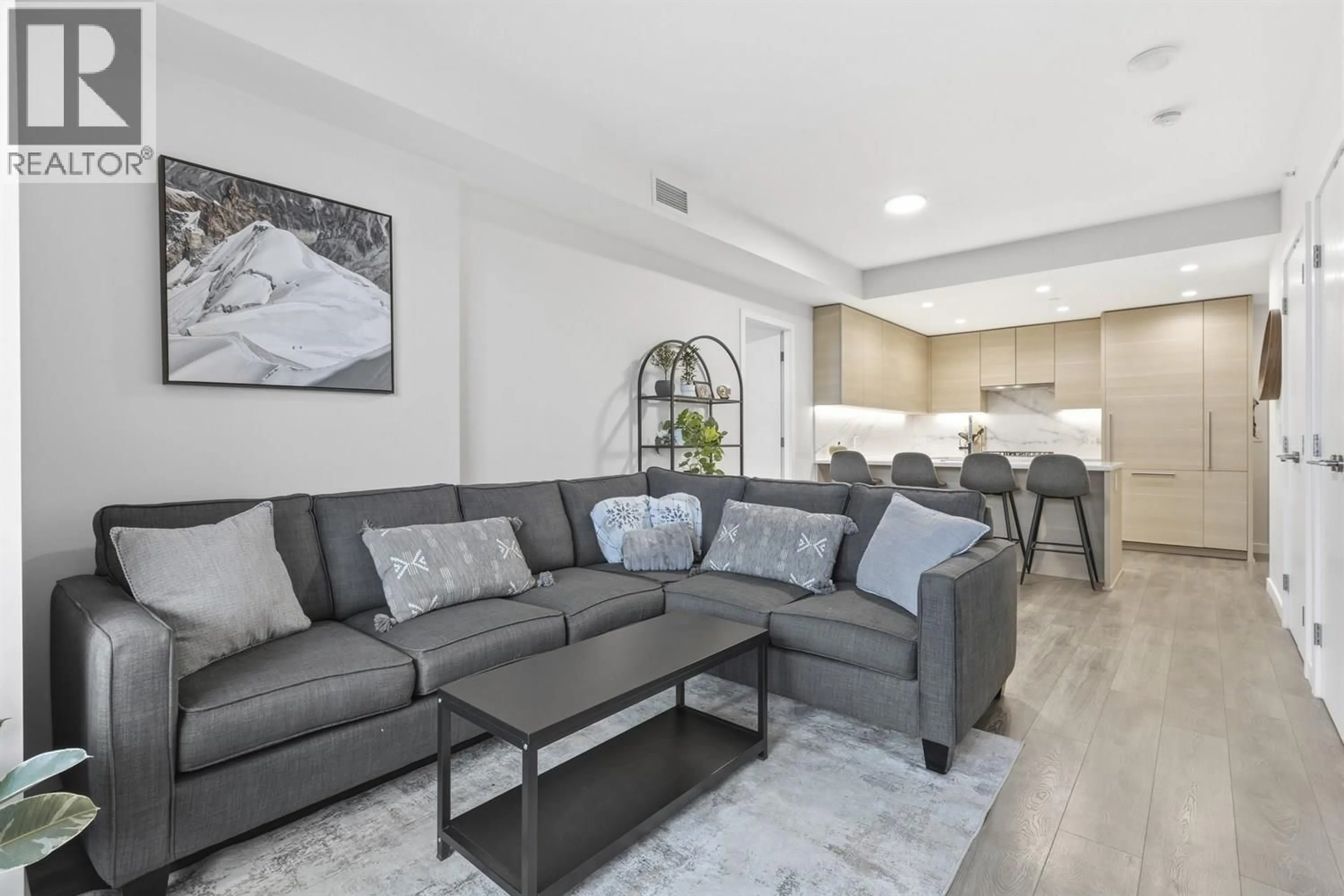 Living room with furniture, unknown for 908 - 308 MORRISSEY ROAD, Port Moody British Columbia V3H0M2