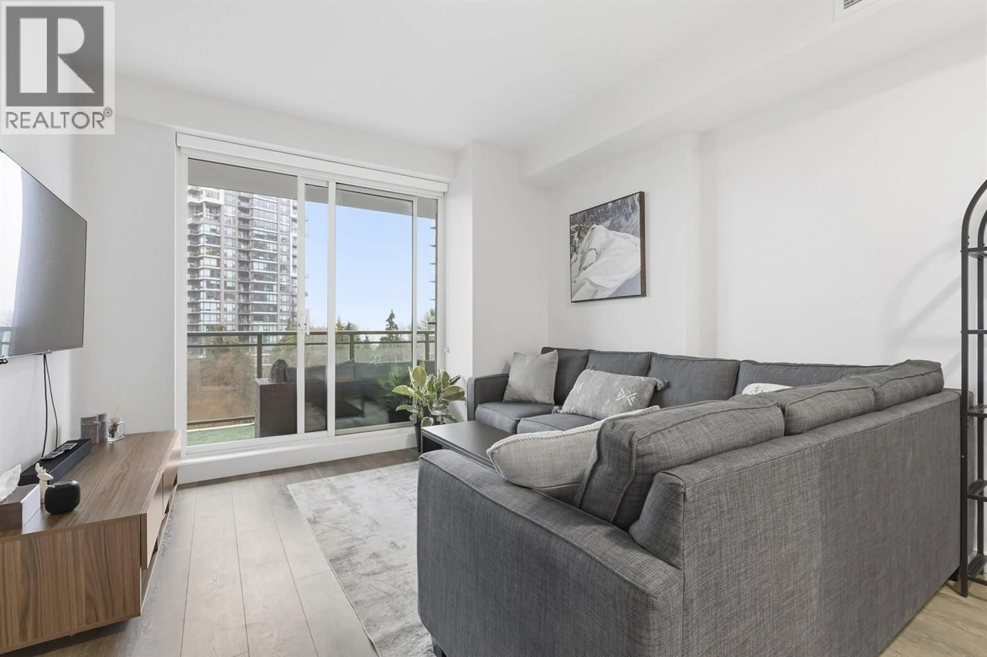 Living room with furniture, unknown for 908 - 308 MORRISSEY ROAD, Port Moody British Columbia V3H0M2