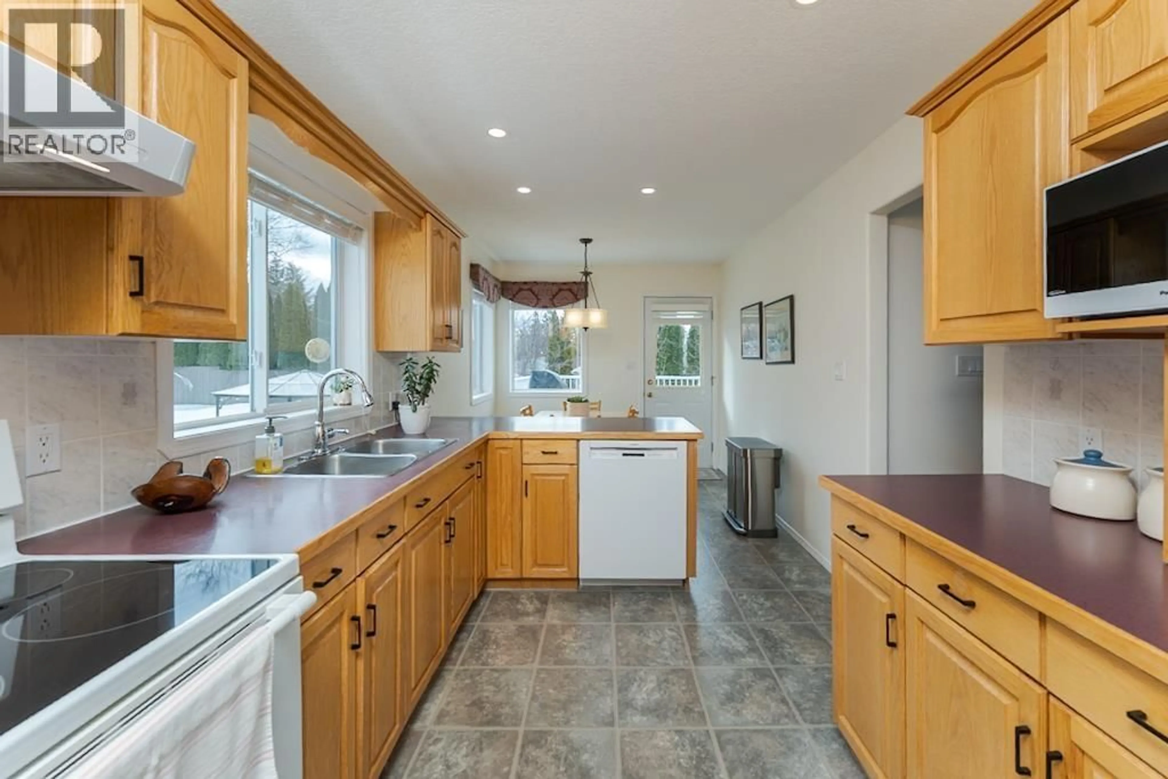 Open concept kitchen, ceramic/tile floor for 4413 STAUBLE ROAD, Prince George British Columbia V2K4X3