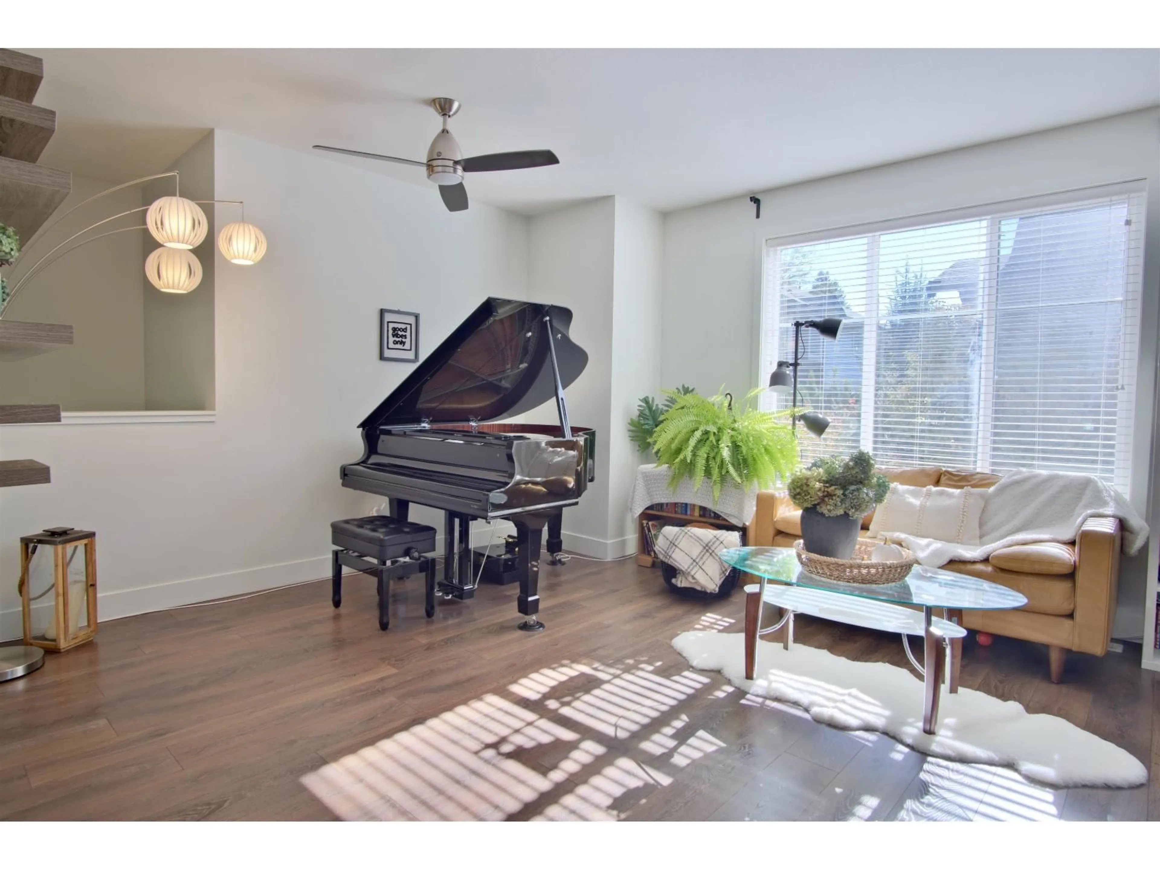 Living room with furniture, wood/laminate floor for 16 - 8217 204B STREET, Langley British Columbia V2Y0V6