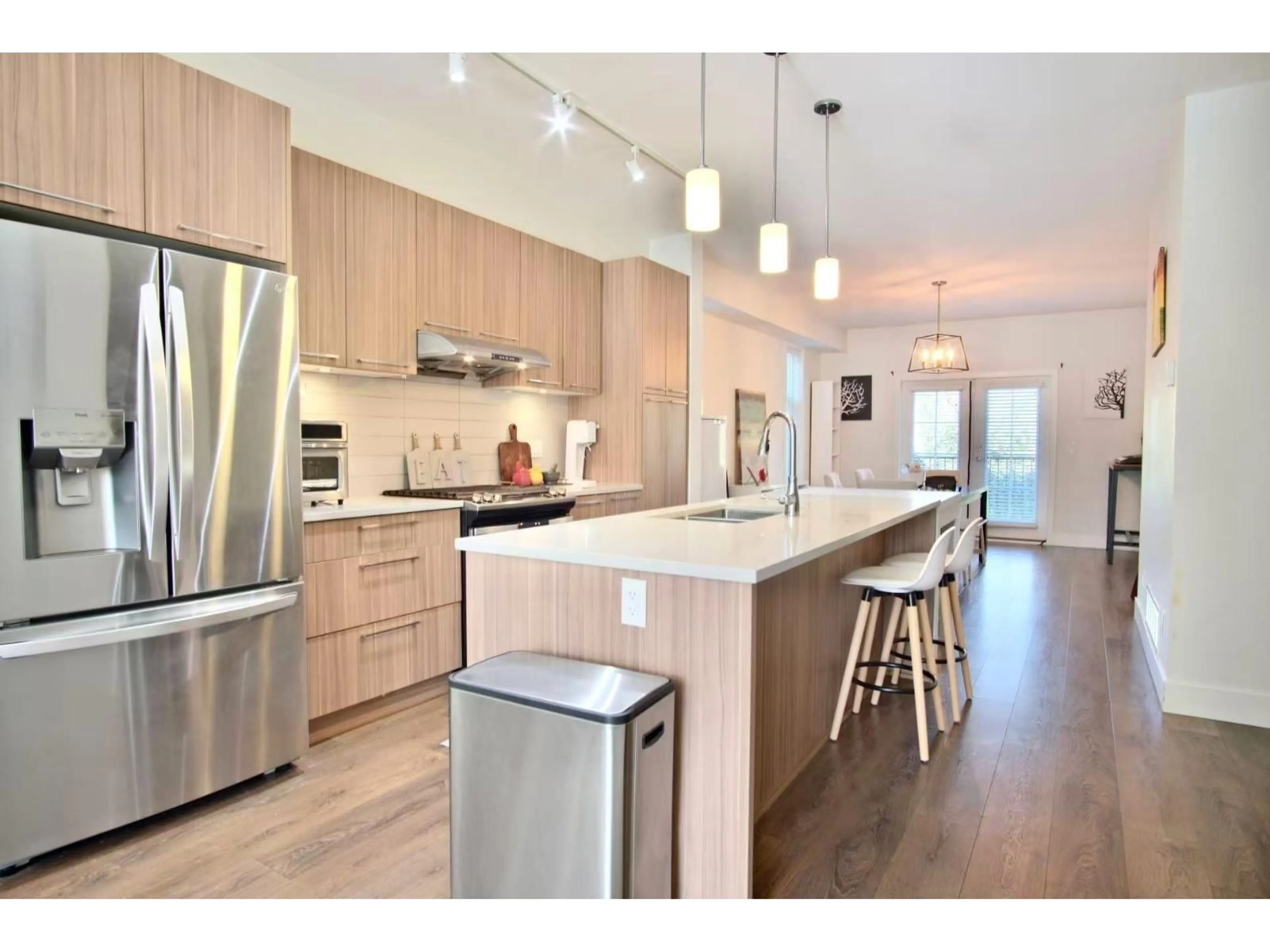 Open concept kitchen, wood/laminate floor for 16 - 8217 204B STREET, Langley British Columbia V2Y0V6