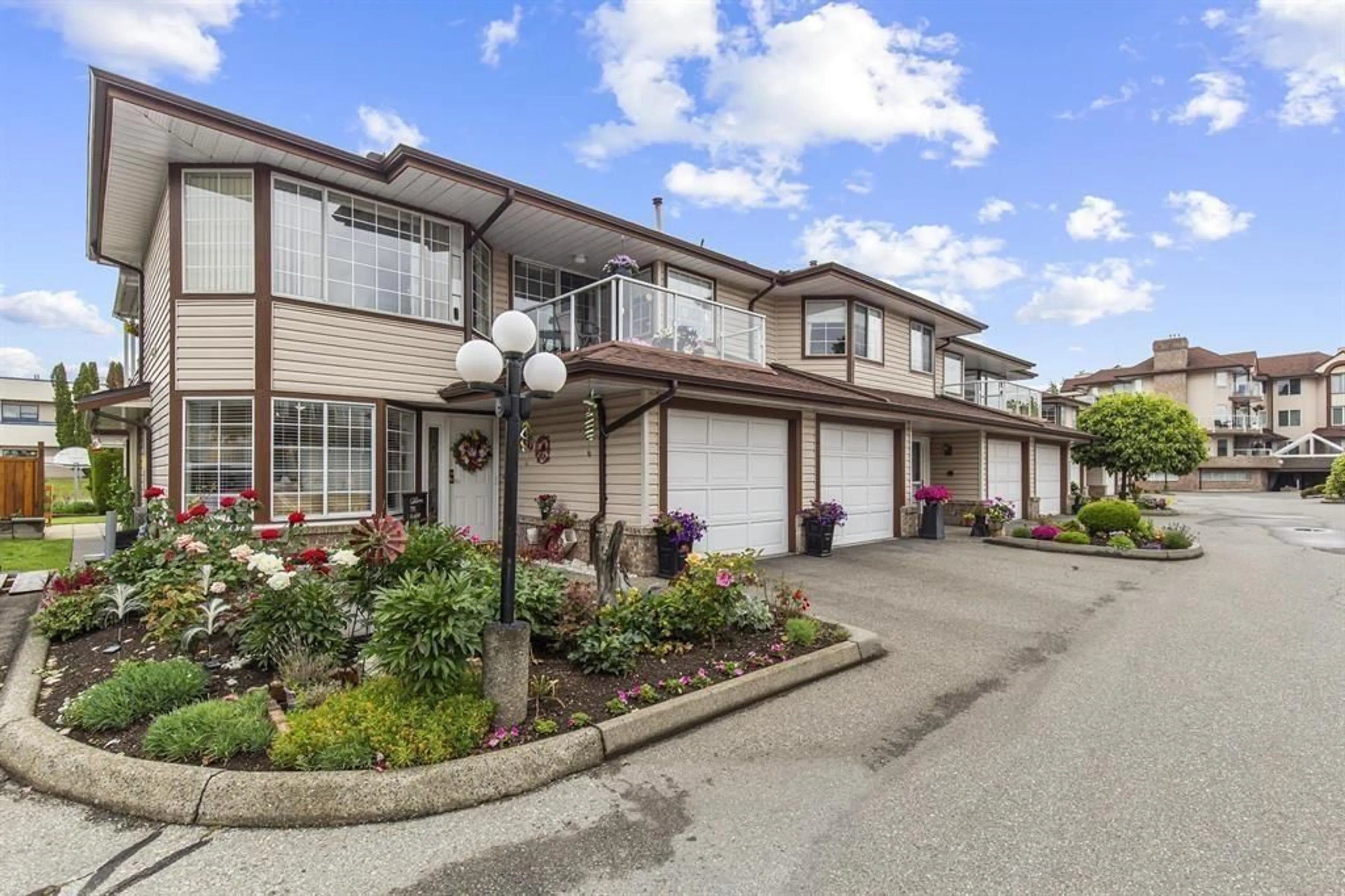 A pic from outside/outdoor area/front of a property/back of a property/a pic from drone, street for 31 - 32659 GEORGE FERGUSON WAY, Abbotsford British Columbia V2T4E4