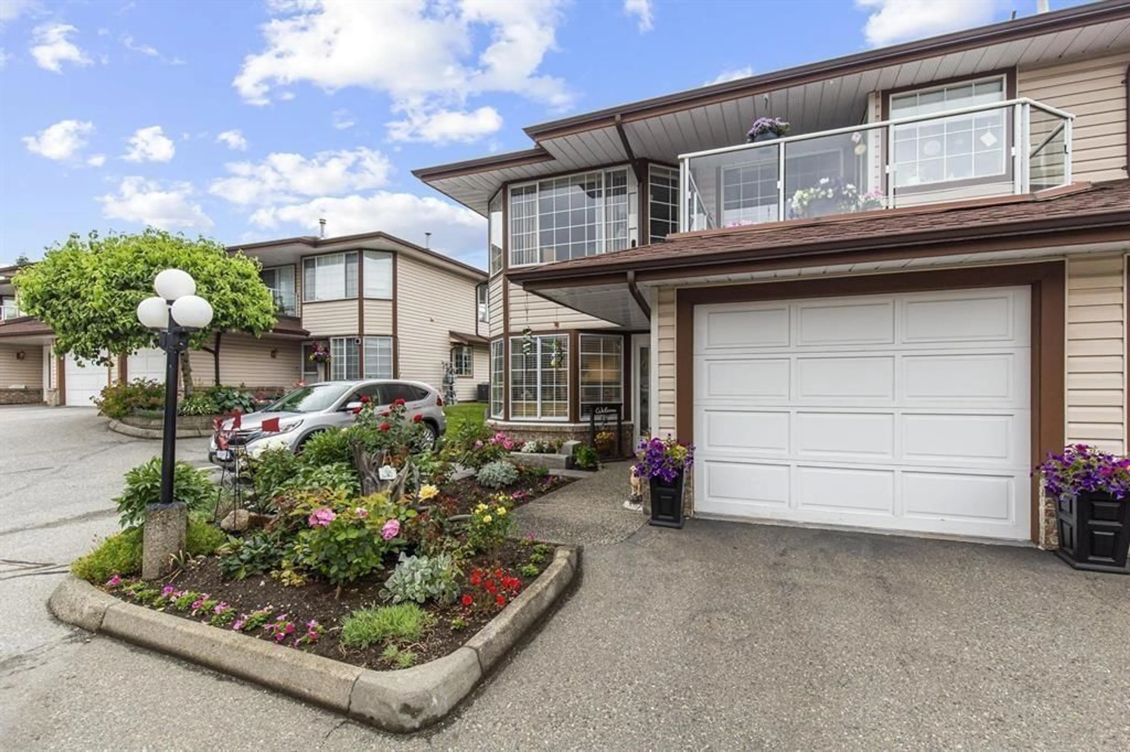A pic from outside/outdoor area/front of a property/back of a property/a pic from drone, street for 31 - 32659 GEORGE FERGUSON WAY, Abbotsford British Columbia V2T4E4