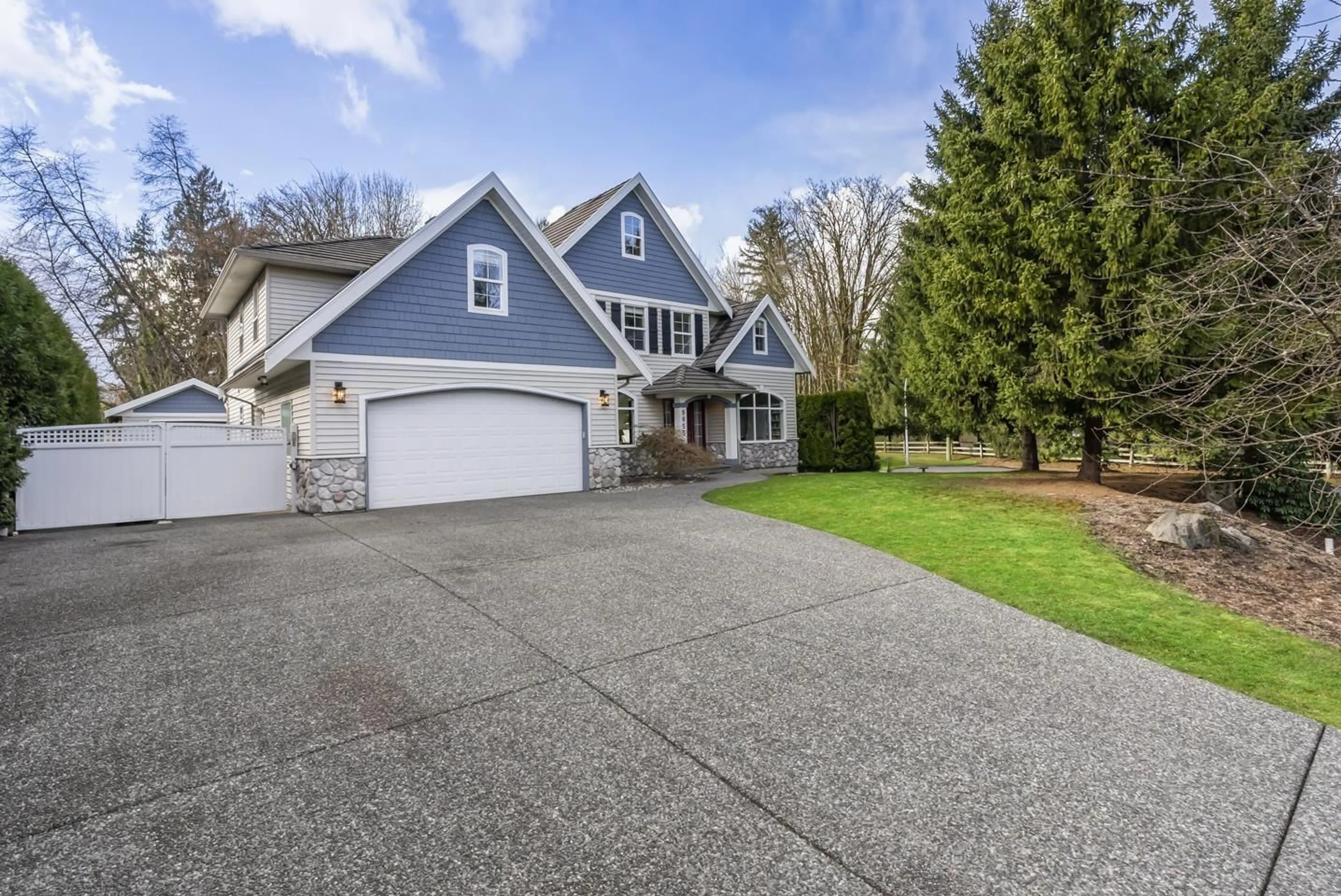 Home with vinyl exterior material, street for 9855 182 STREET, Surrey British Columbia V4N5A9