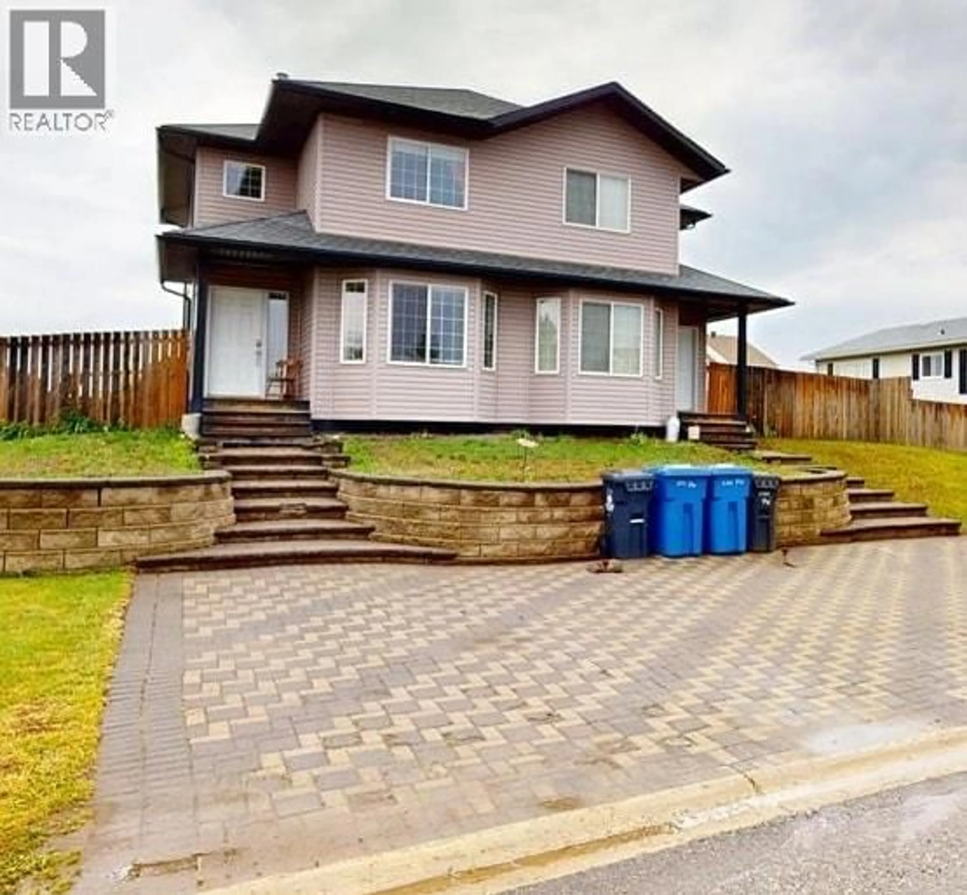 A pic from outside/outdoor area/front of a property/back of a property/a pic from drone, street for 10711 89 STREET, Fort St. John British Columbia V1J5Y3