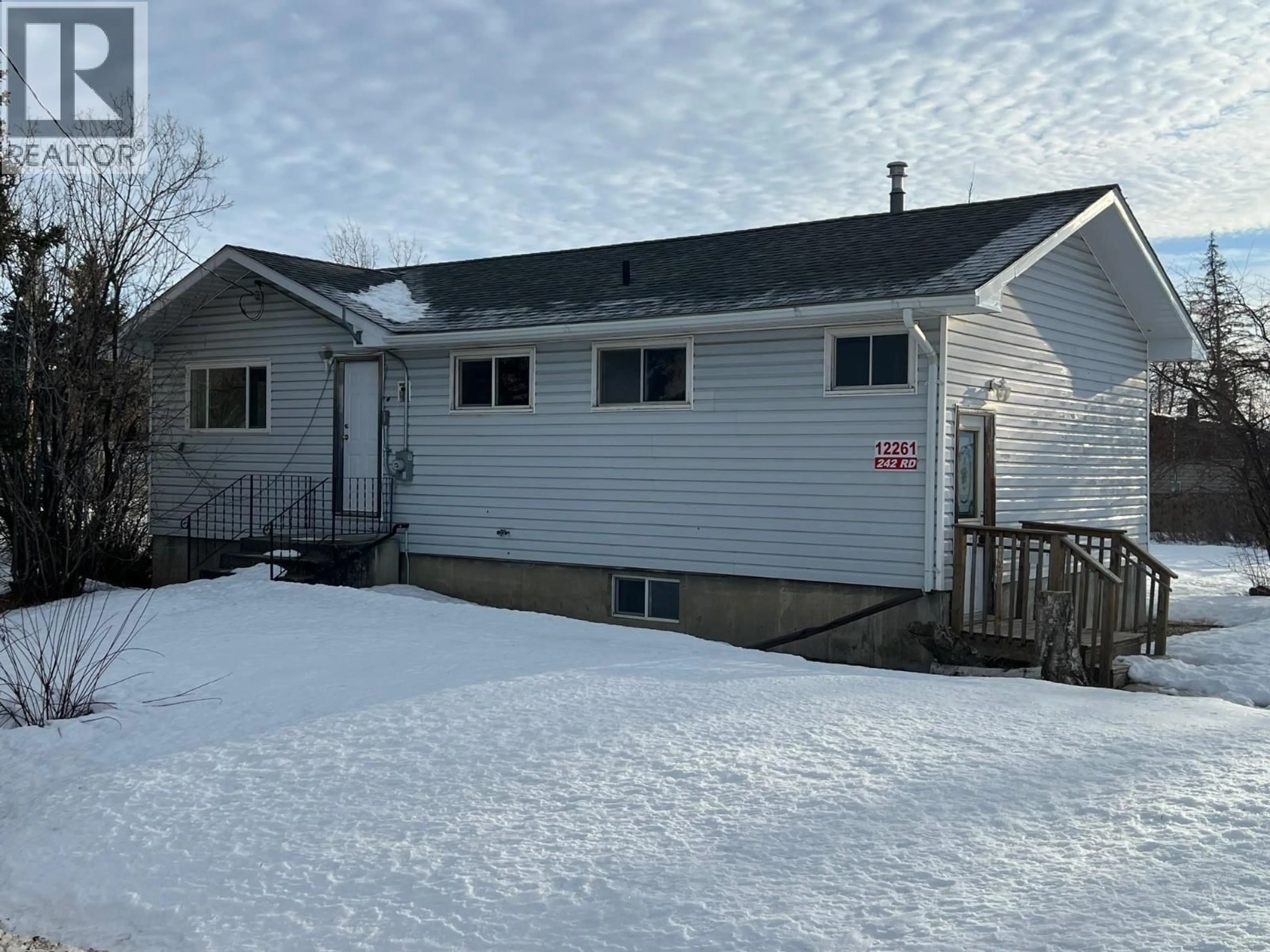 A pic from outside/outdoor area/front of a property/back of a property/a pic from drone, street for 12261 242 ROAD, Fort St. John British Columbia V1J4M7