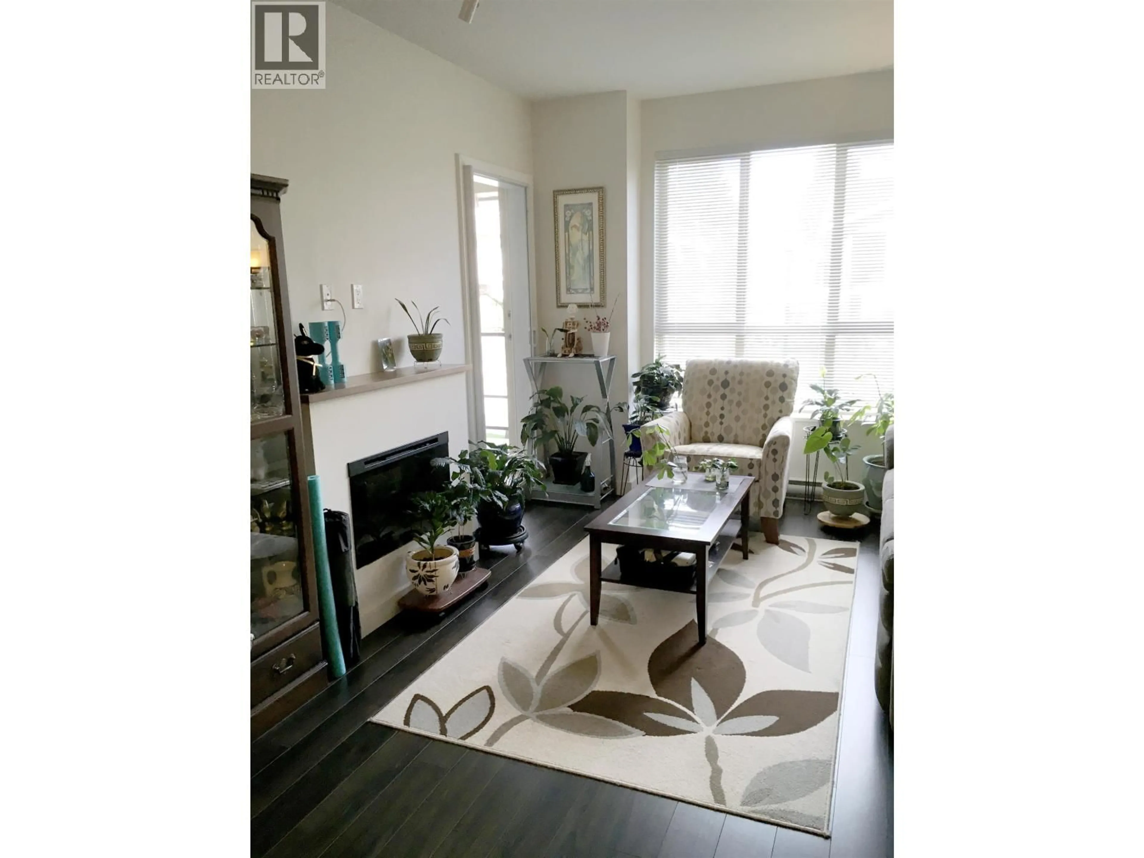 Living room with furniture, unknown for 213 - 250 FRANCIS WAY, New Westminster British Columbia V3L0E6