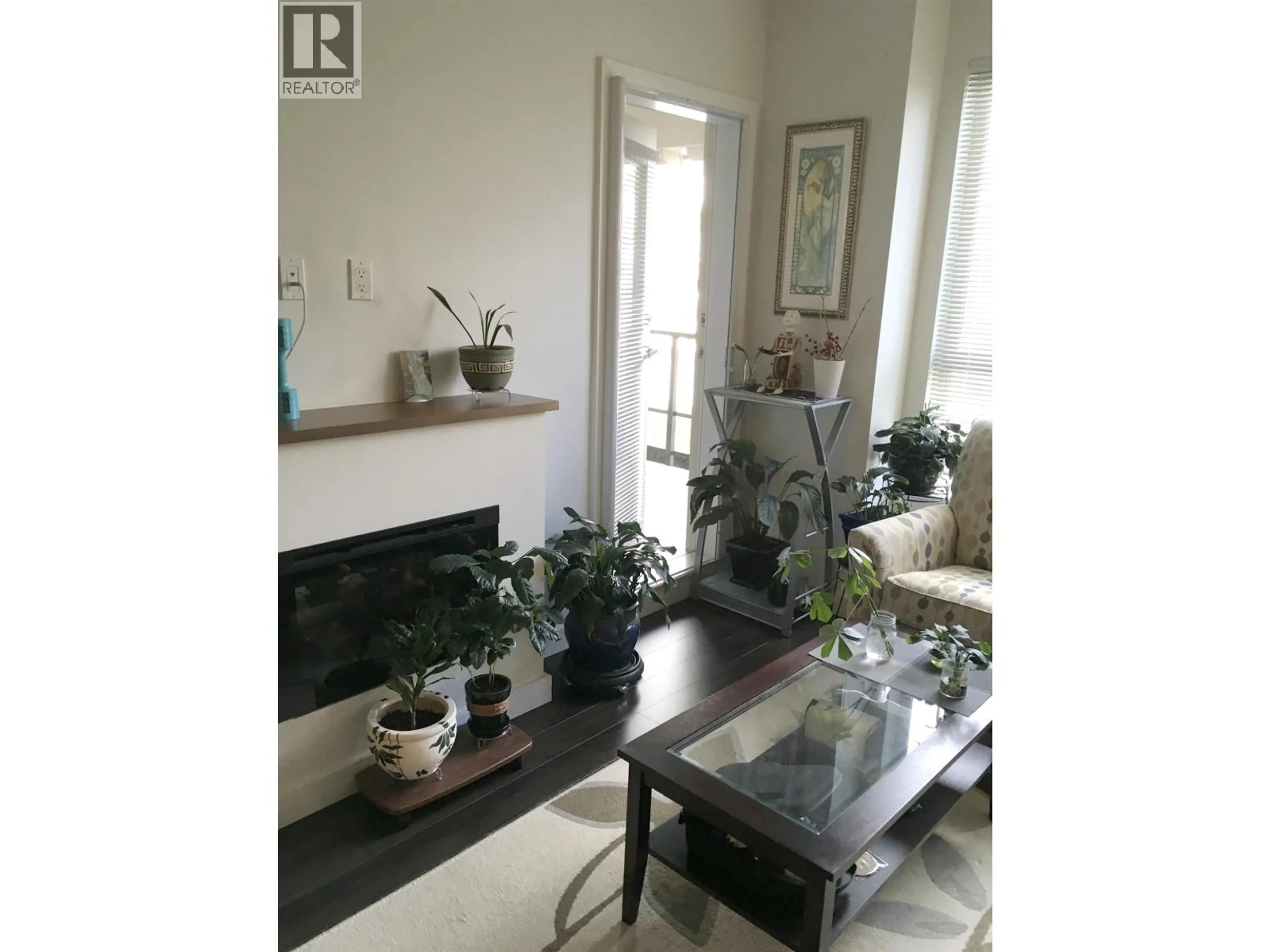 Living room with furniture, unknown for 213 - 250 FRANCIS WAY, New Westminster British Columbia V3L0E6