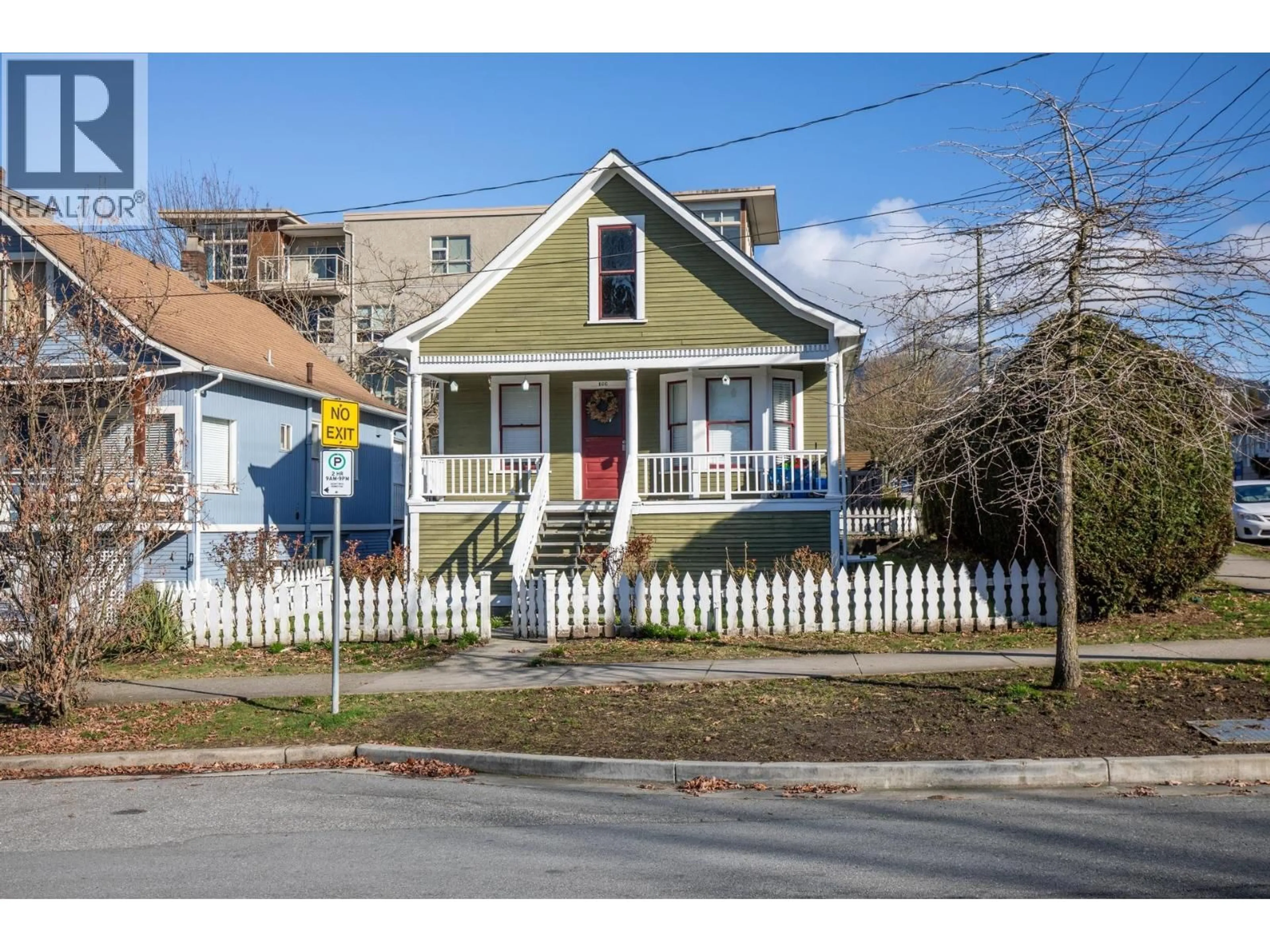 Home with vinyl exterior material, street for 166 10TH STREET, North Vancouver British Columbia V7L2C8