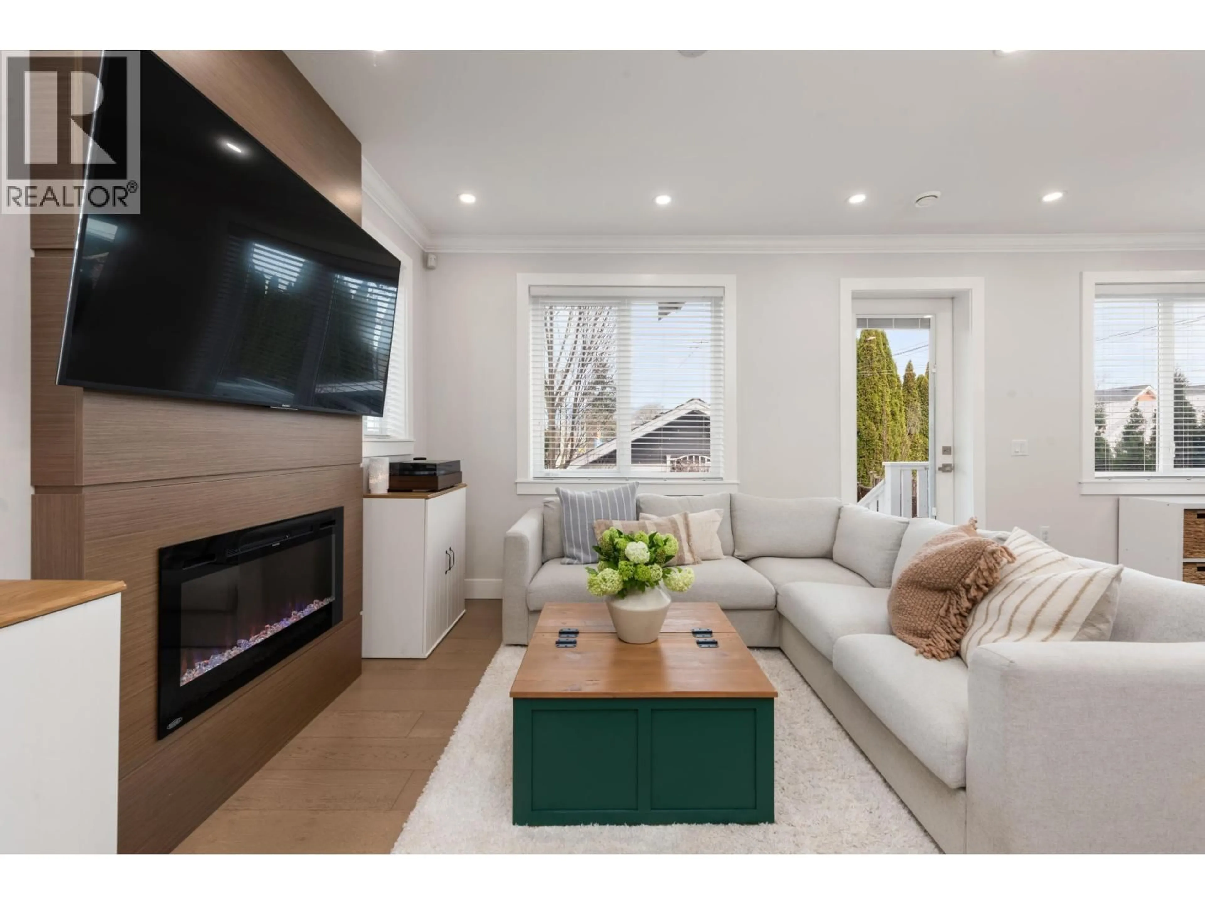 Living room with furniture, wood/laminate floor for 2876 CLARK DRIVE, Vancouver British Columbia V5N0E9