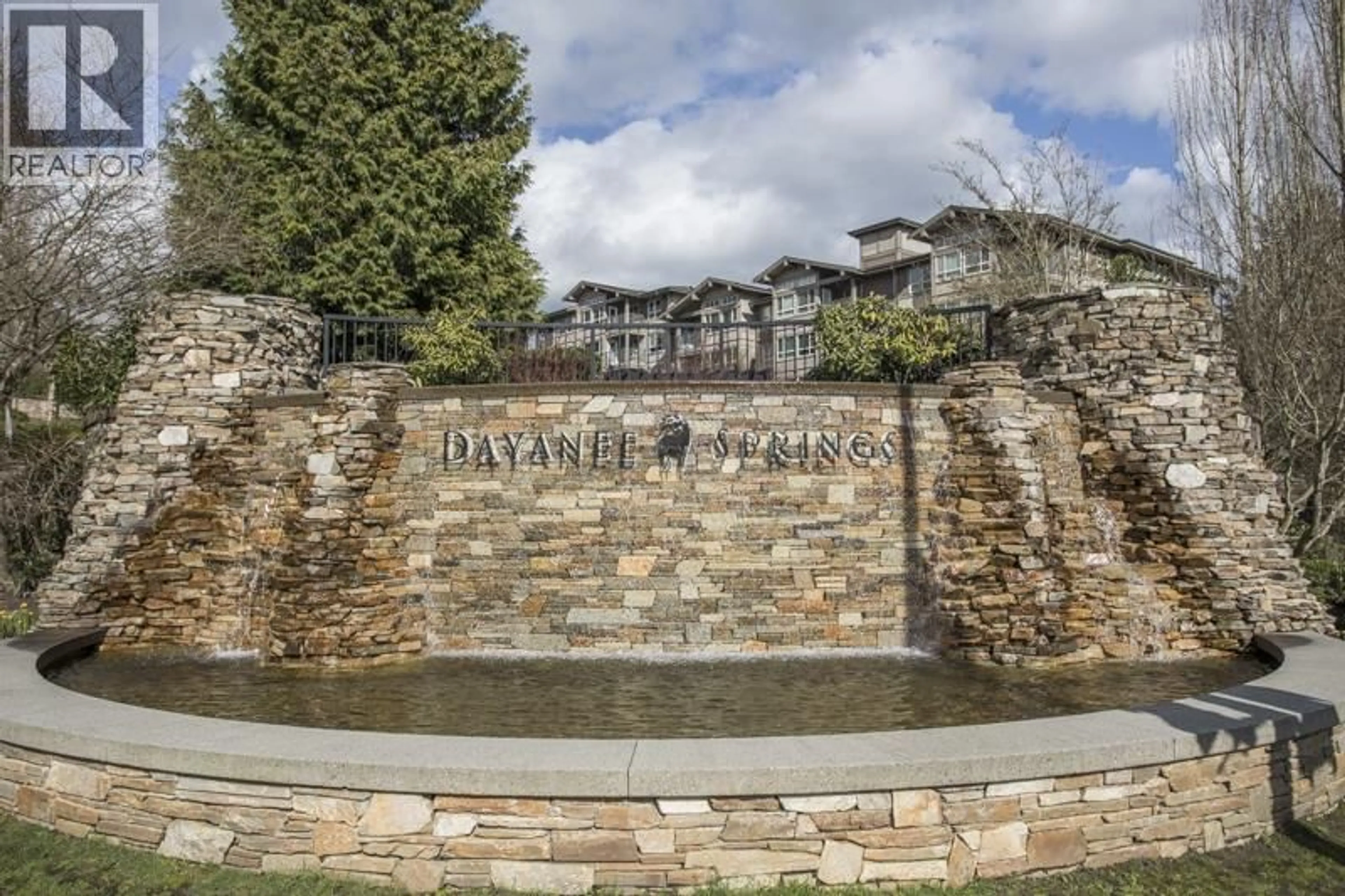 A pic from outside/outdoor area/front of a property/back of a property/a pic from drone, water/lake/river/ocean view for 215 - 3110 DAYANEE SPRINGS BOULEVARD, Coquitlam British Columbia V3E0B4