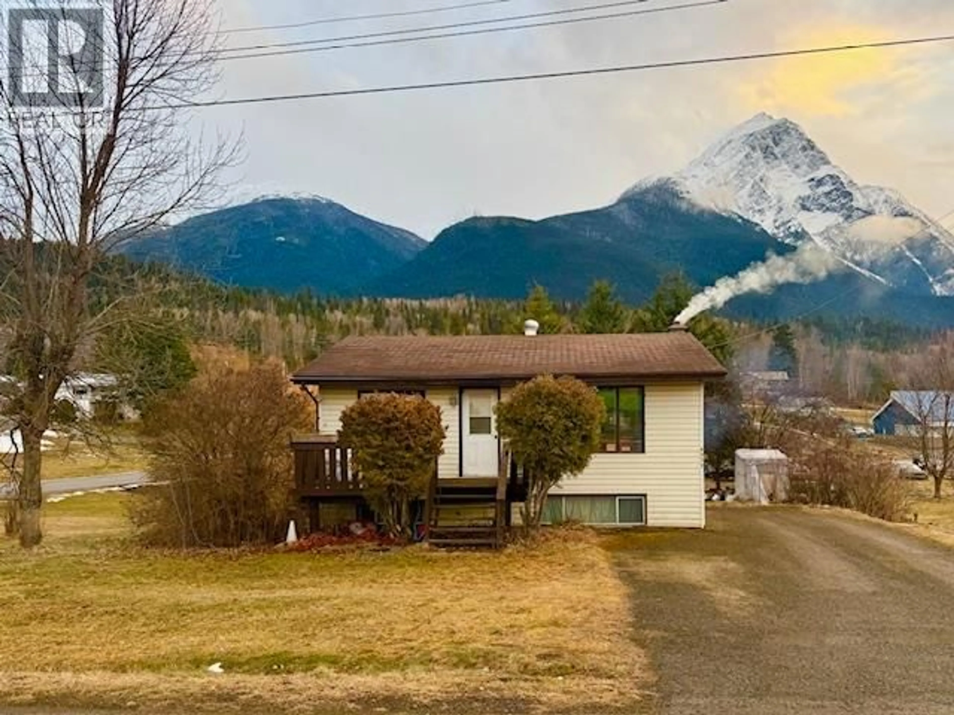 A pic from outside/outdoor area/front of a property/back of a property/a pic from drone, mountain view for 4372 12TH AVENUE, New Hazelton British Columbia V0J2J1