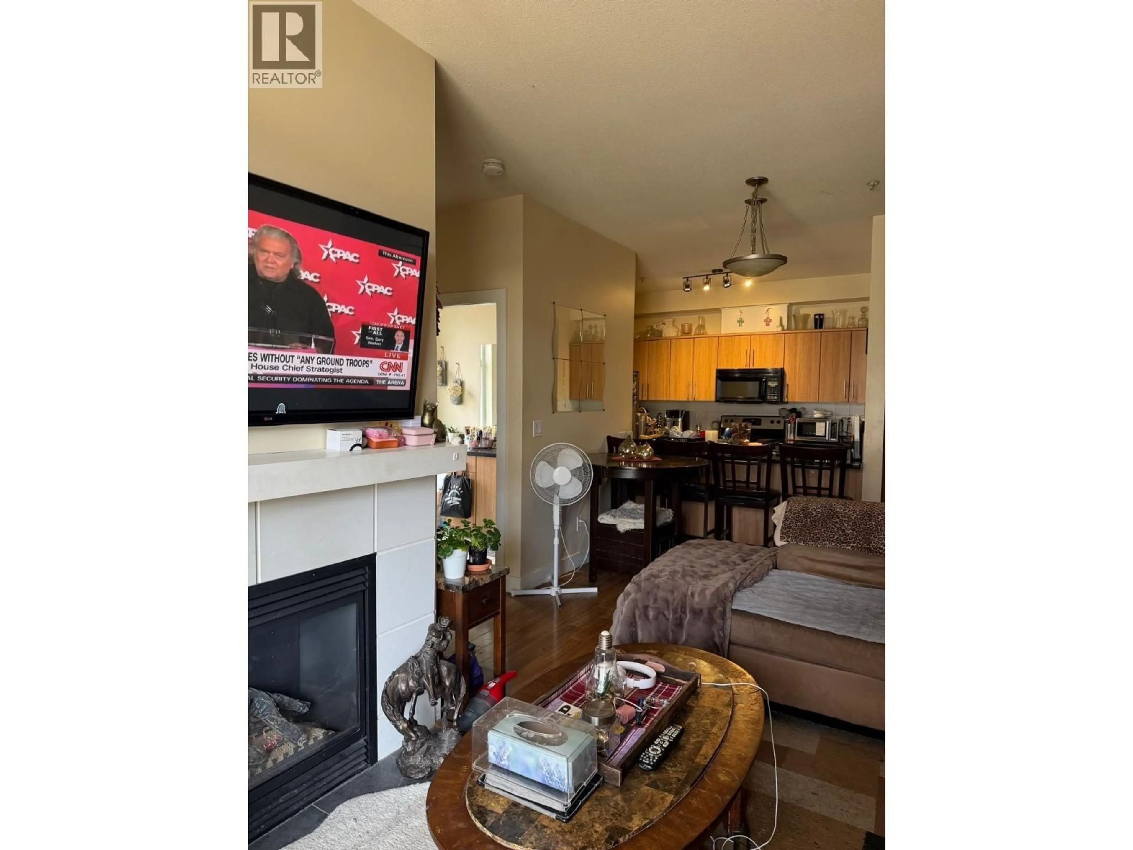 Living room with furniture, wood/laminate floor for 109 - 3240 ST JOHNS STREET, Port Moody British Columbia V3H0C1