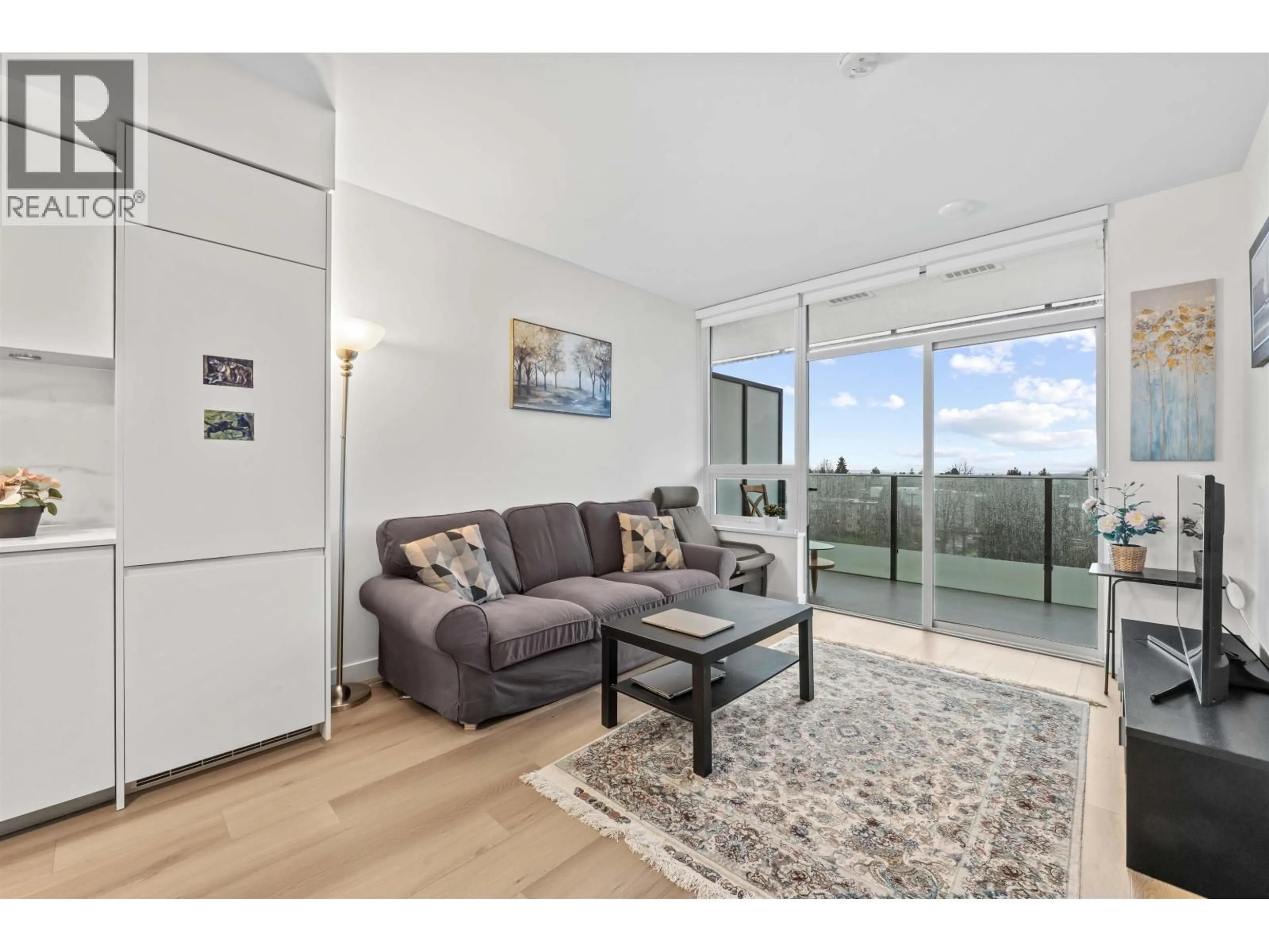 Living room with furniture, wood/laminate floor for 706 - 6463 SILVER AVENUE, Burnaby British Columbia V5H0K4