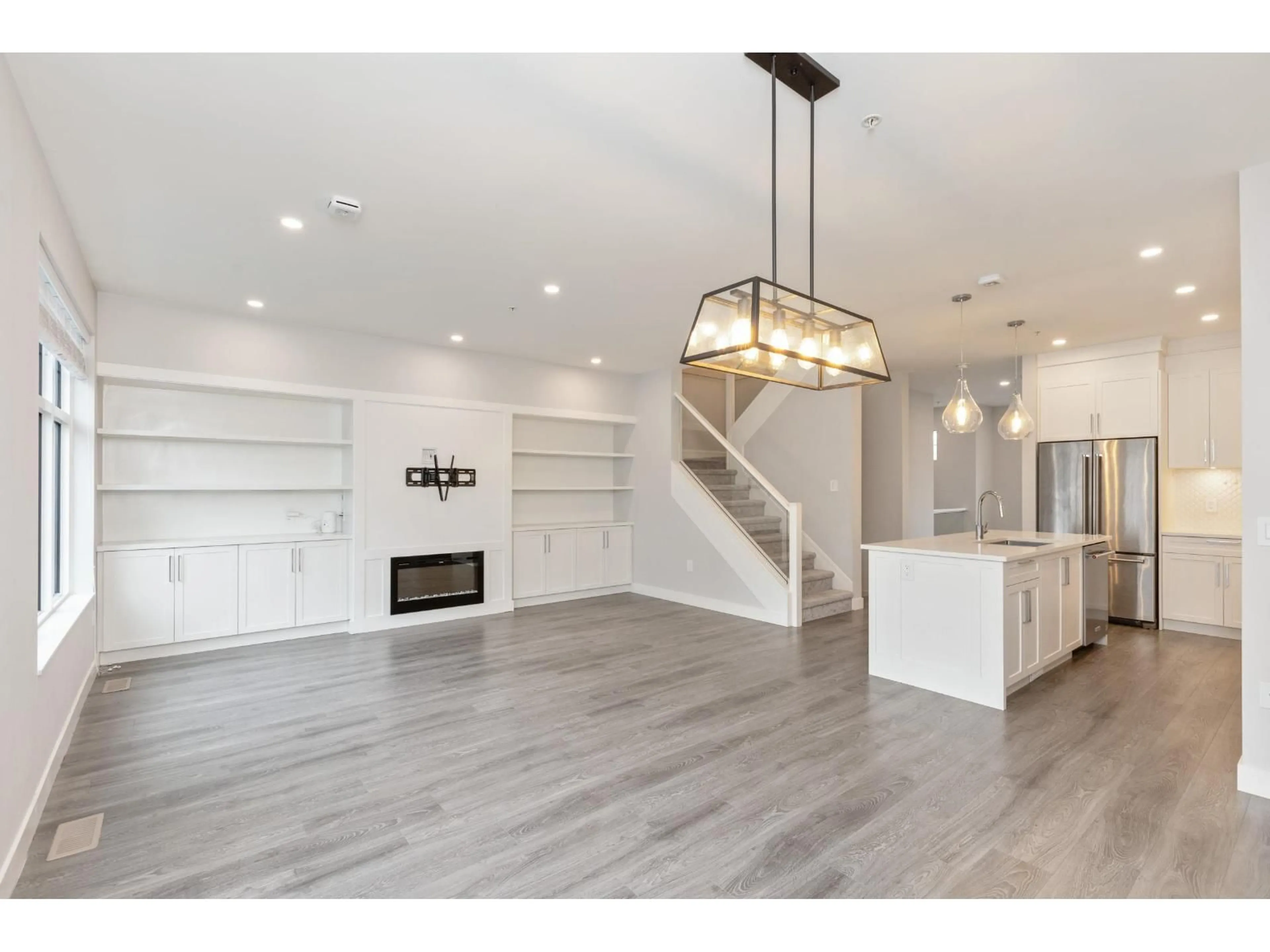 Open concept kitchen, wood/laminate floor for 15 - 20327 72B AVENUE, Langley British Columbia V2Y4J6