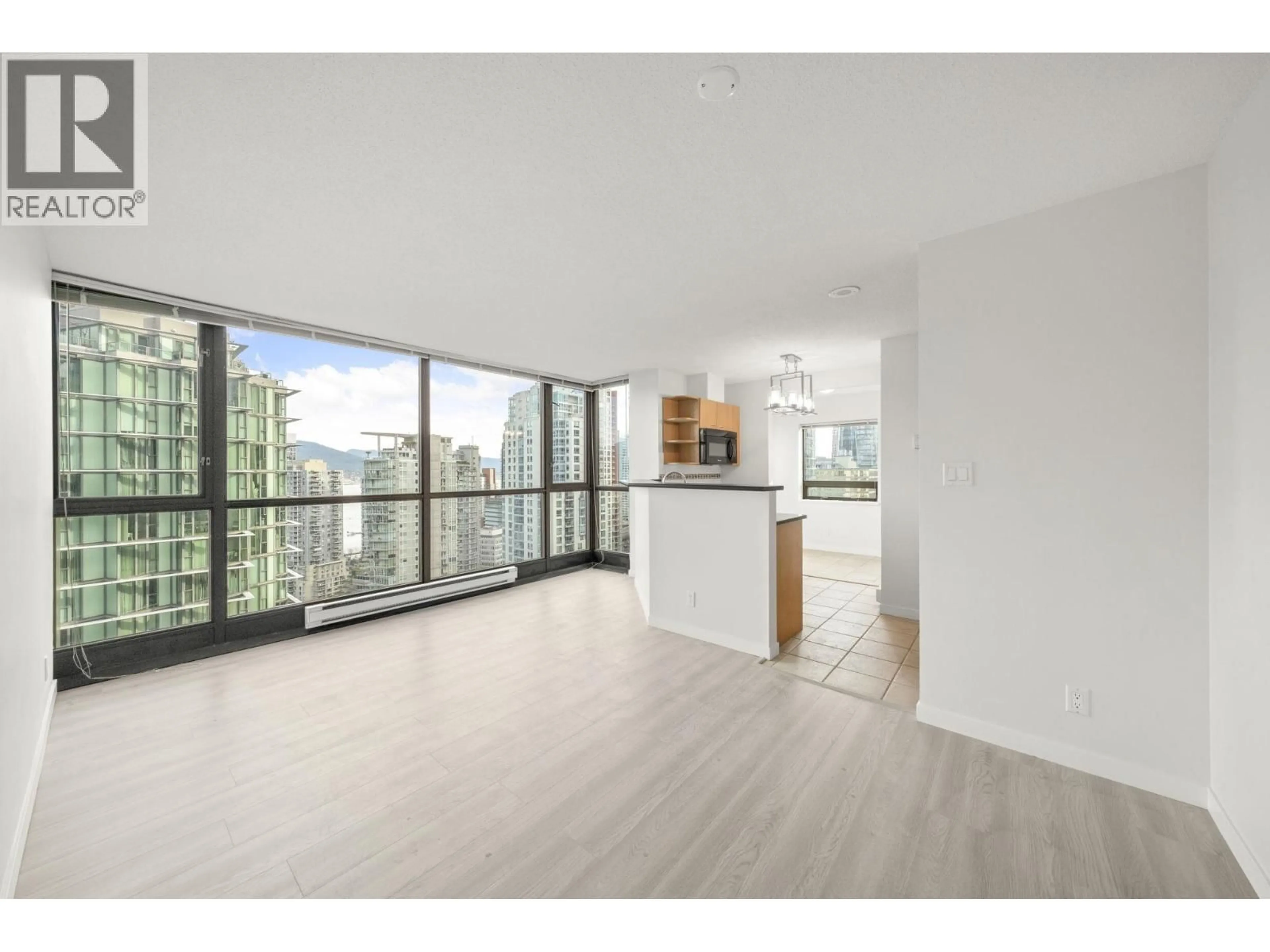 Open concept kitchen, wood/laminate floor for 2502 - 1331 ALBERNI STREET, Vancouver British Columbia V6E4S1