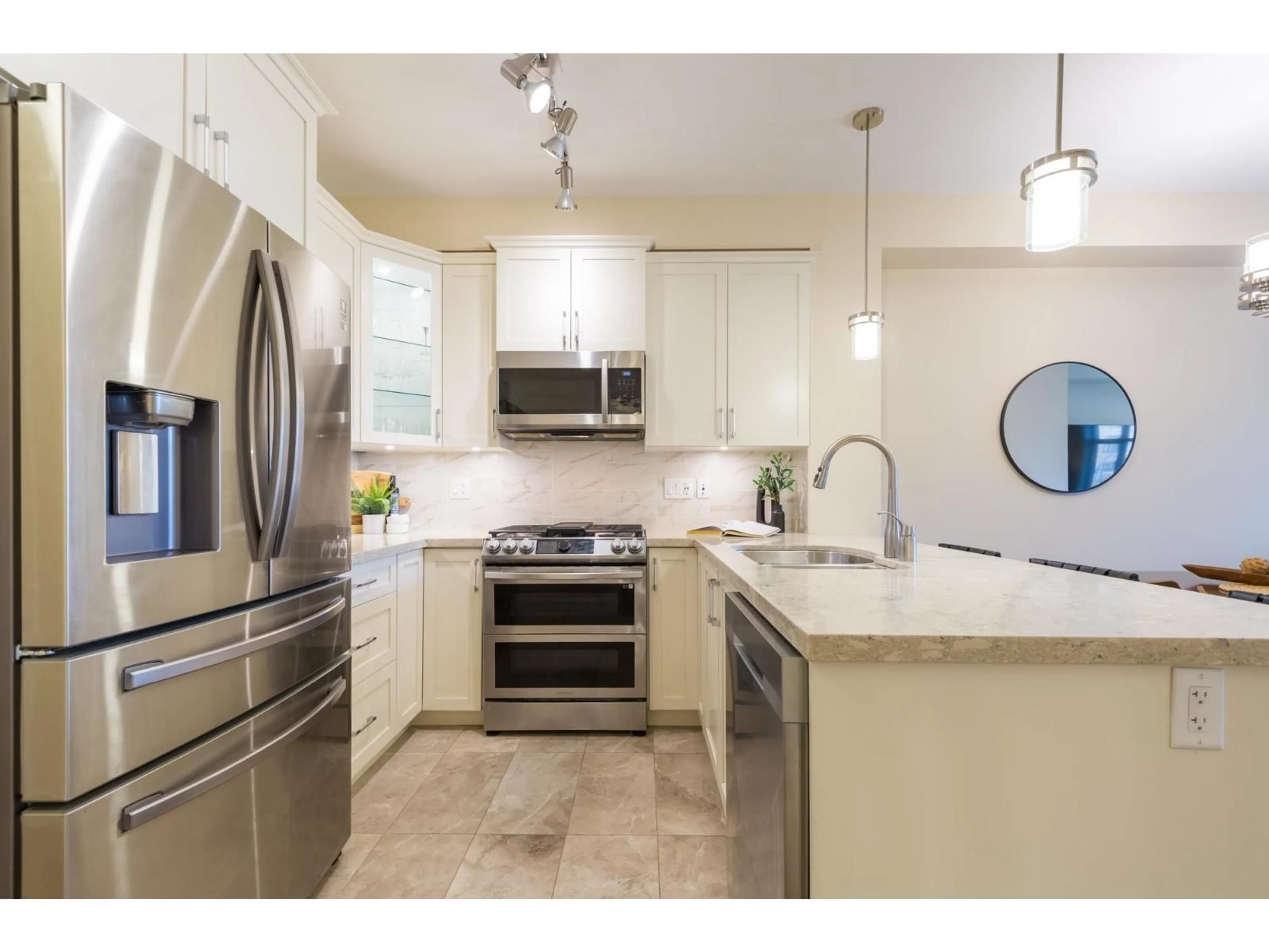 Open concept kitchen, ceramic/tile floor for 311 - 8561 203A STREET, Langley British Columbia V2Y3L7