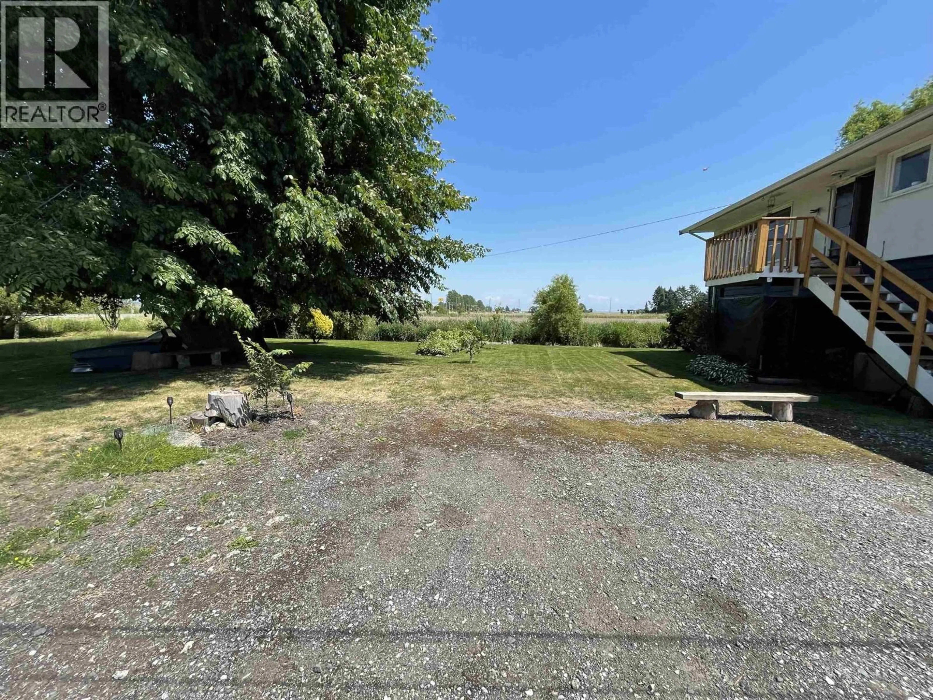 A pic from outside/outdoor area/front of a property/back of a property/a pic from drone, street for 8640 LADNER TRUNK ROAD, Delta British Columbia V4K3N3
