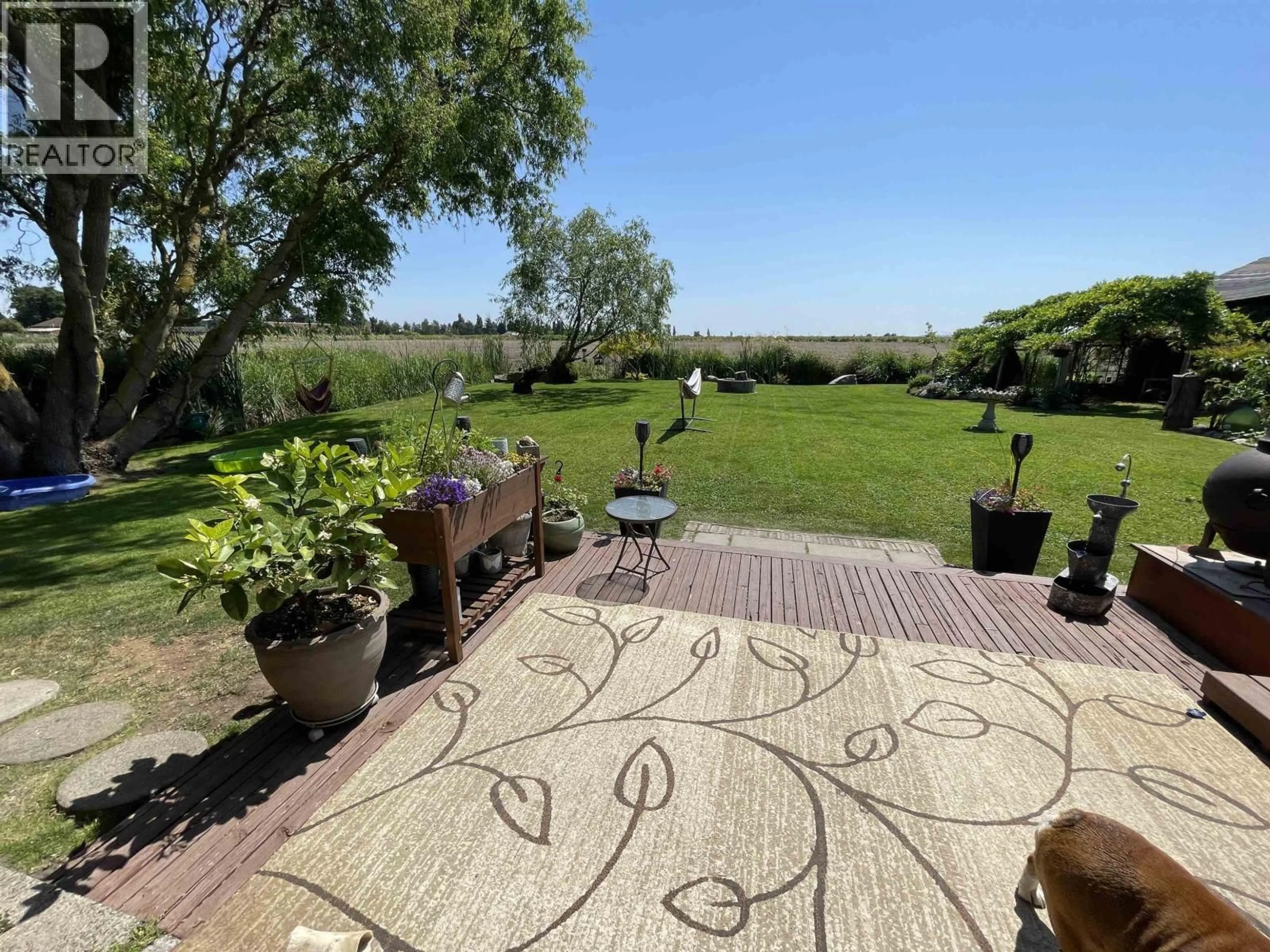 A pic from outside/outdoor area/front of a property/back of a property/a pic from drone, water/lake/river/ocean view for 8640 LADNER TRUNK ROAD, Delta British Columbia V4K3N3