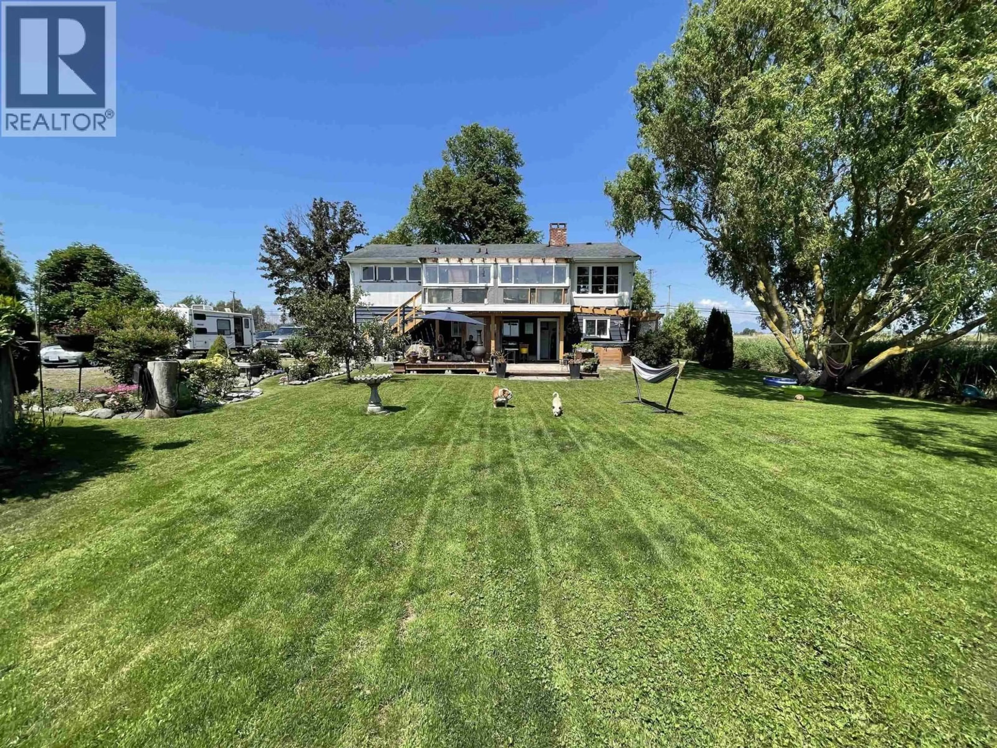 A pic from outside/outdoor area/front of a property/back of a property/a pic from drone, water/lake/river/ocean view for 8640 LADNER TRUNK ROAD, Delta British Columbia V4K3N3