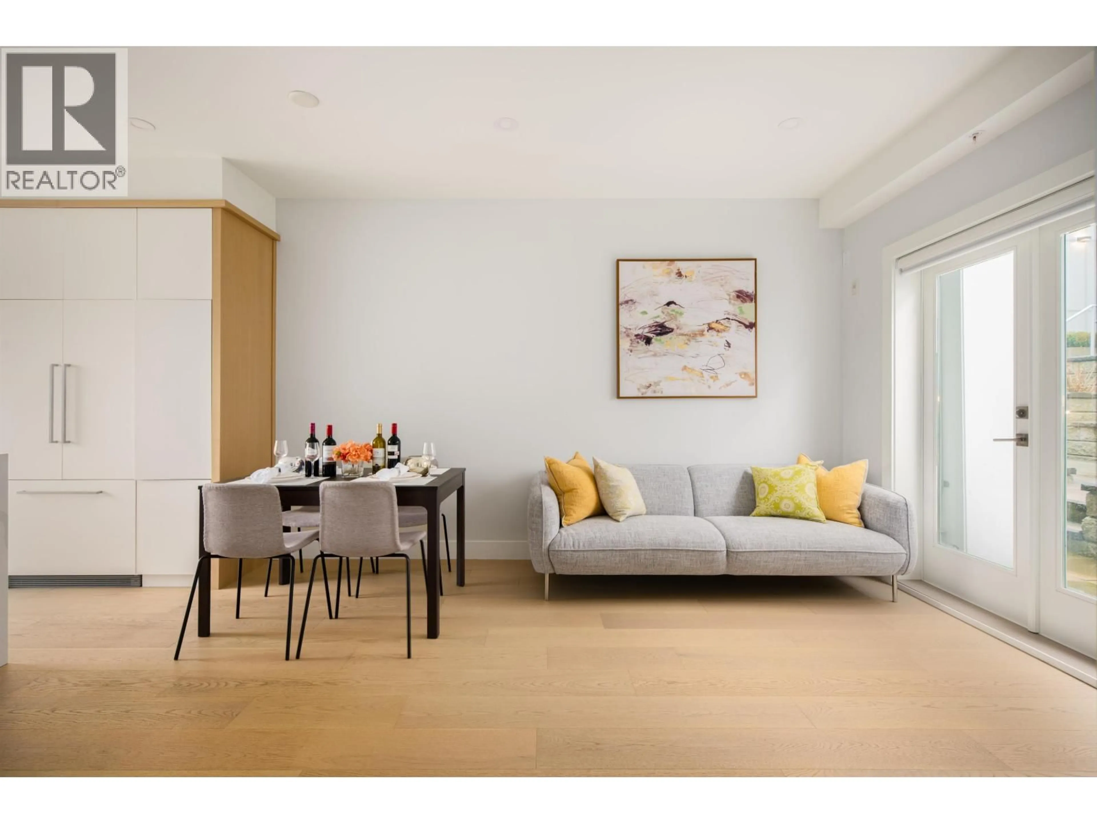 Living room with furniture, wood/laminate floor for 7661 GRANVILLE STREET, Vancouver British Columbia V6P4Y8