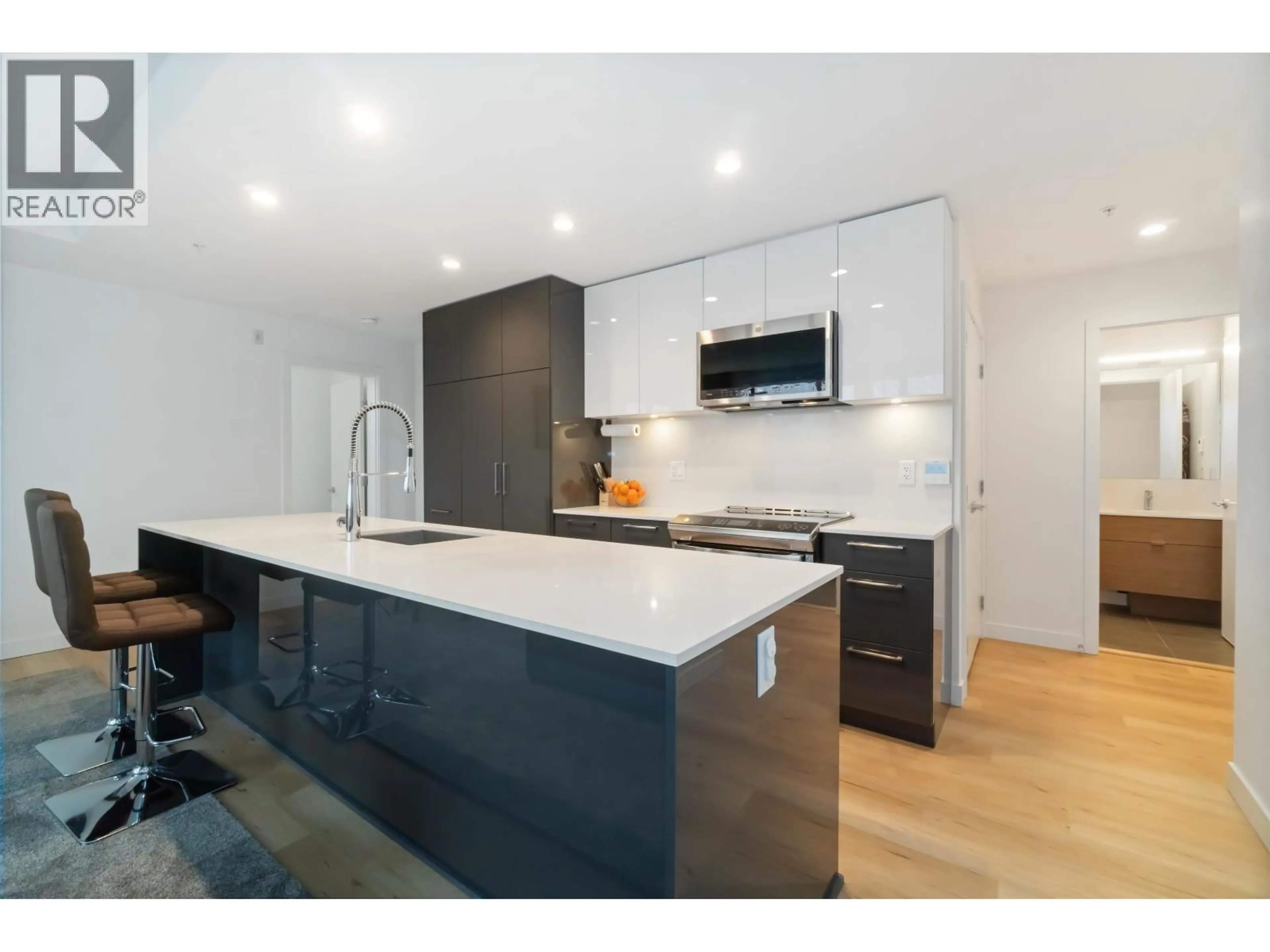 Open concept kitchen, wood/laminate floor for 505 - 2446 SHAUGHNESSY STREET, Port Coquitlam British Columbia V3C0T7