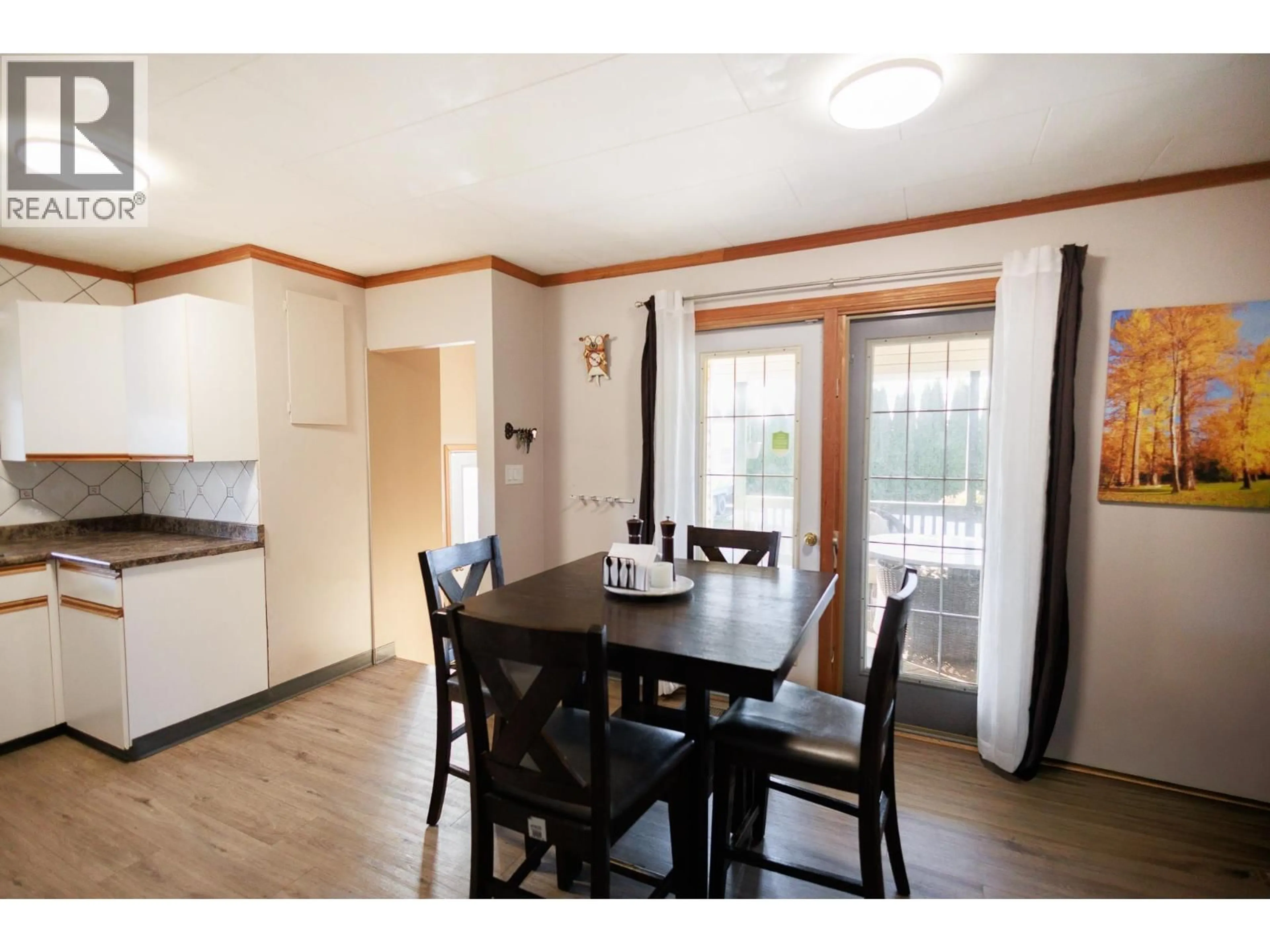 Dining room, wood/laminate floor for 4937 PARK AVENUE, Terrace British Columbia V8G4E1