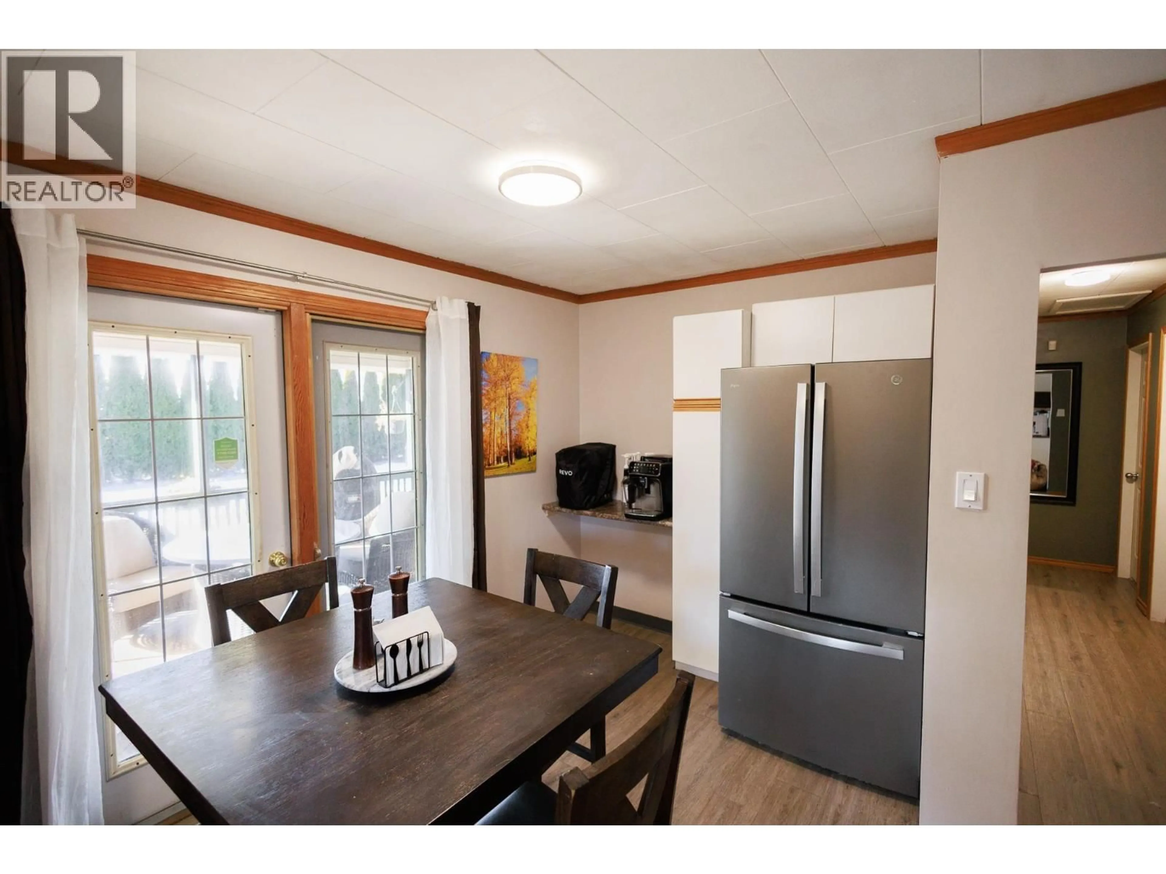 Open concept kitchen, wood/laminate floor for 4937 PARK AVENUE, Terrace British Columbia V8G4E1