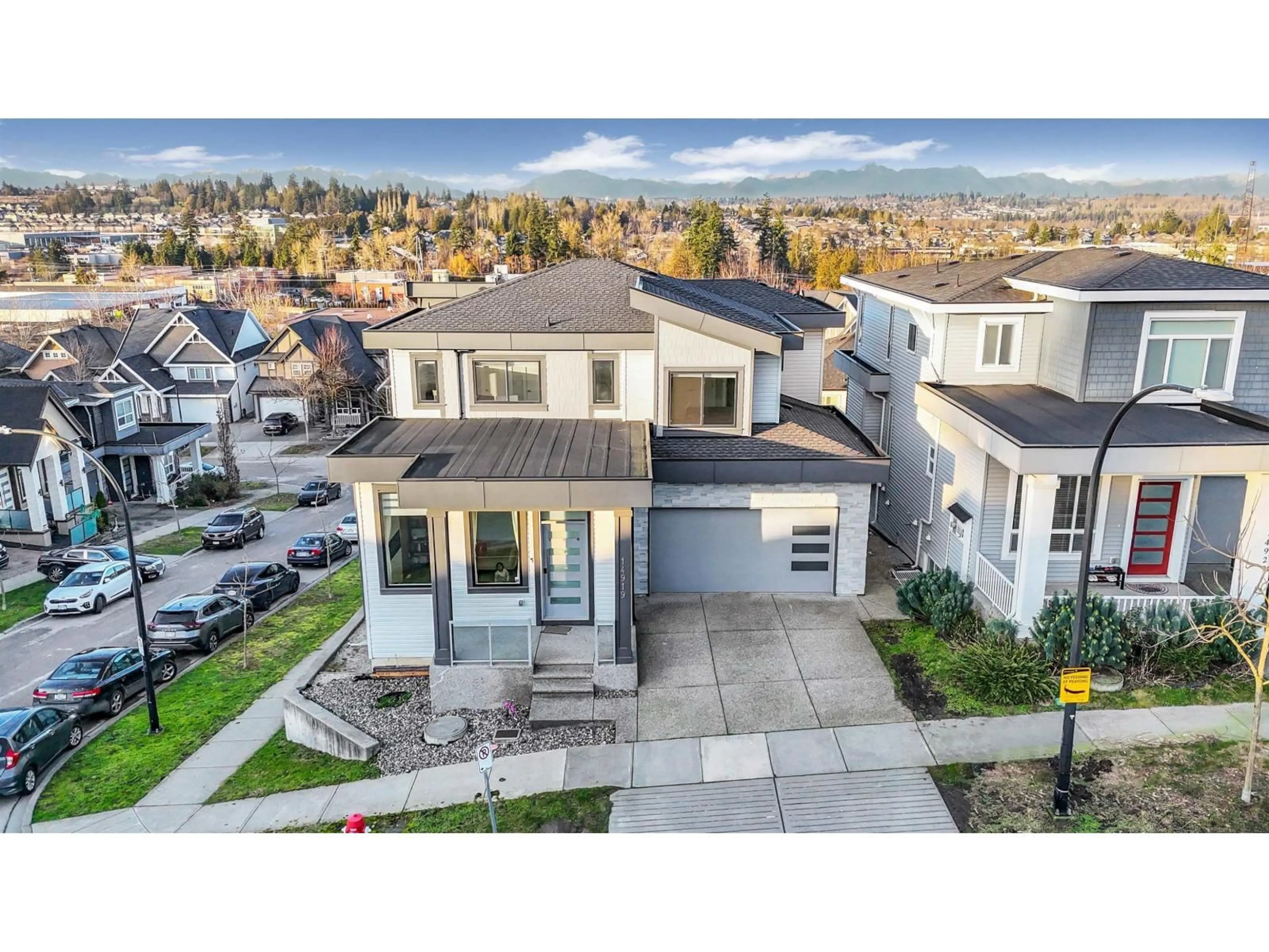 A pic from outside/outdoor area/front of a property/back of a property/a pic from drone, mountain view for 14919 62A AVENUE, Surrey British Columbia V3S7X3