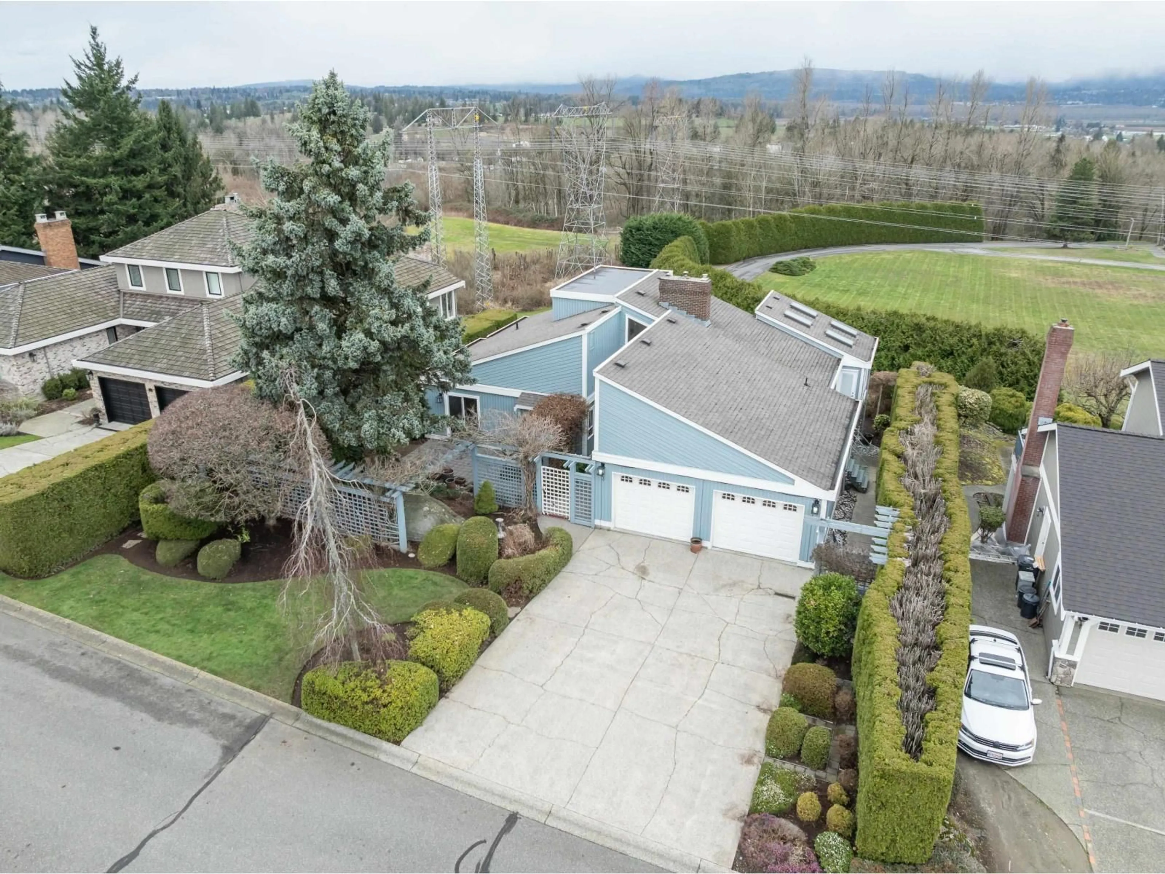 A pic from outside/outdoor area/front of a property/back of a property/a pic from drone, street for 3 - 3755 CLEARBROOK ROAD, Abbotsford British Columbia V2T5A8