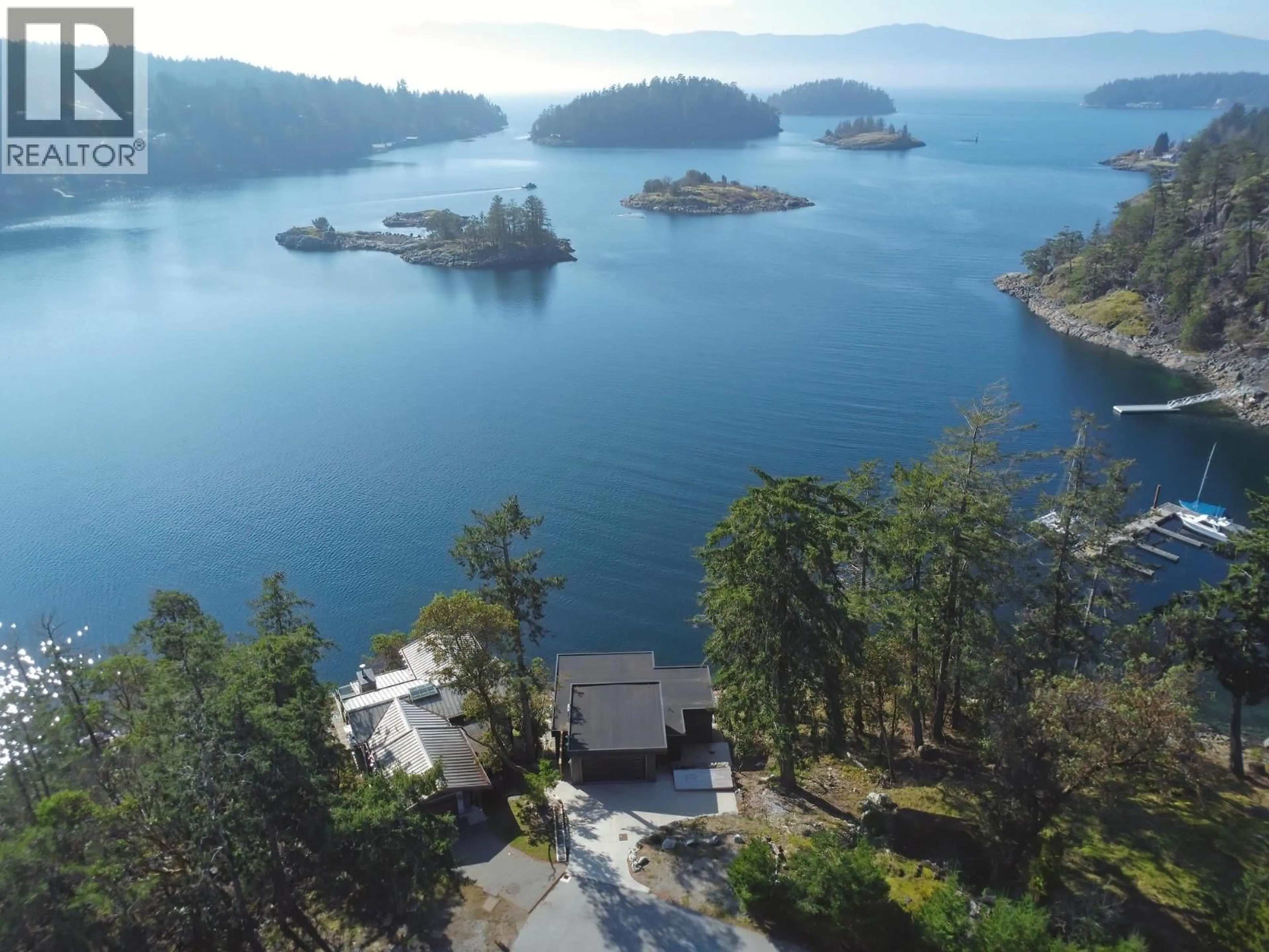 A pic from outside/outdoor area/front of a property/back of a property/a pic from drone, water/lake/river/ocean view for 13221 PINEHAVEN WAY, Garden Bay British Columbia V0N1S1