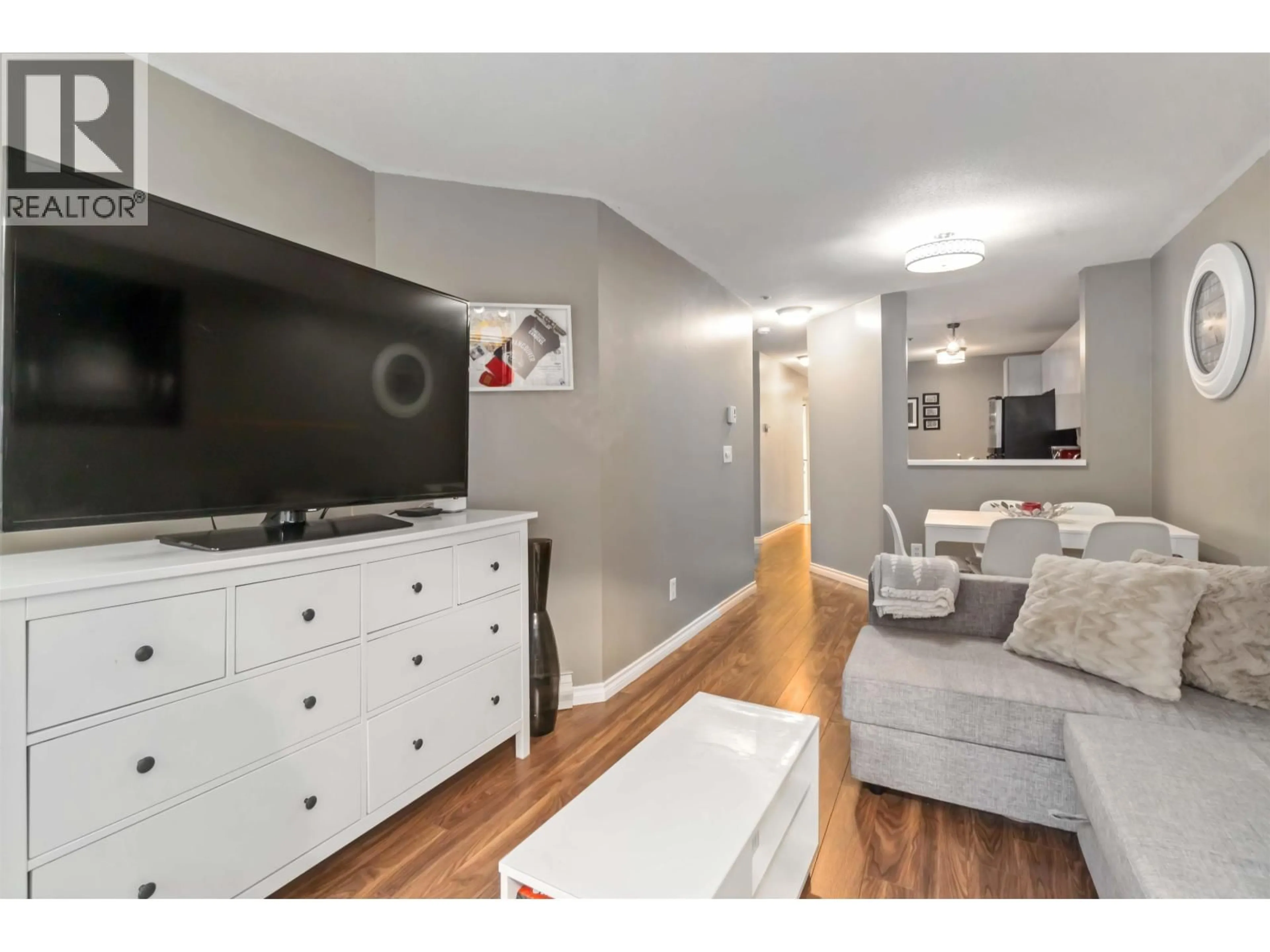 Living room with furniture, wood/laminate floor for 105 - 509 CARNARVON STREET, New Westminster British Columbia V3L5S4