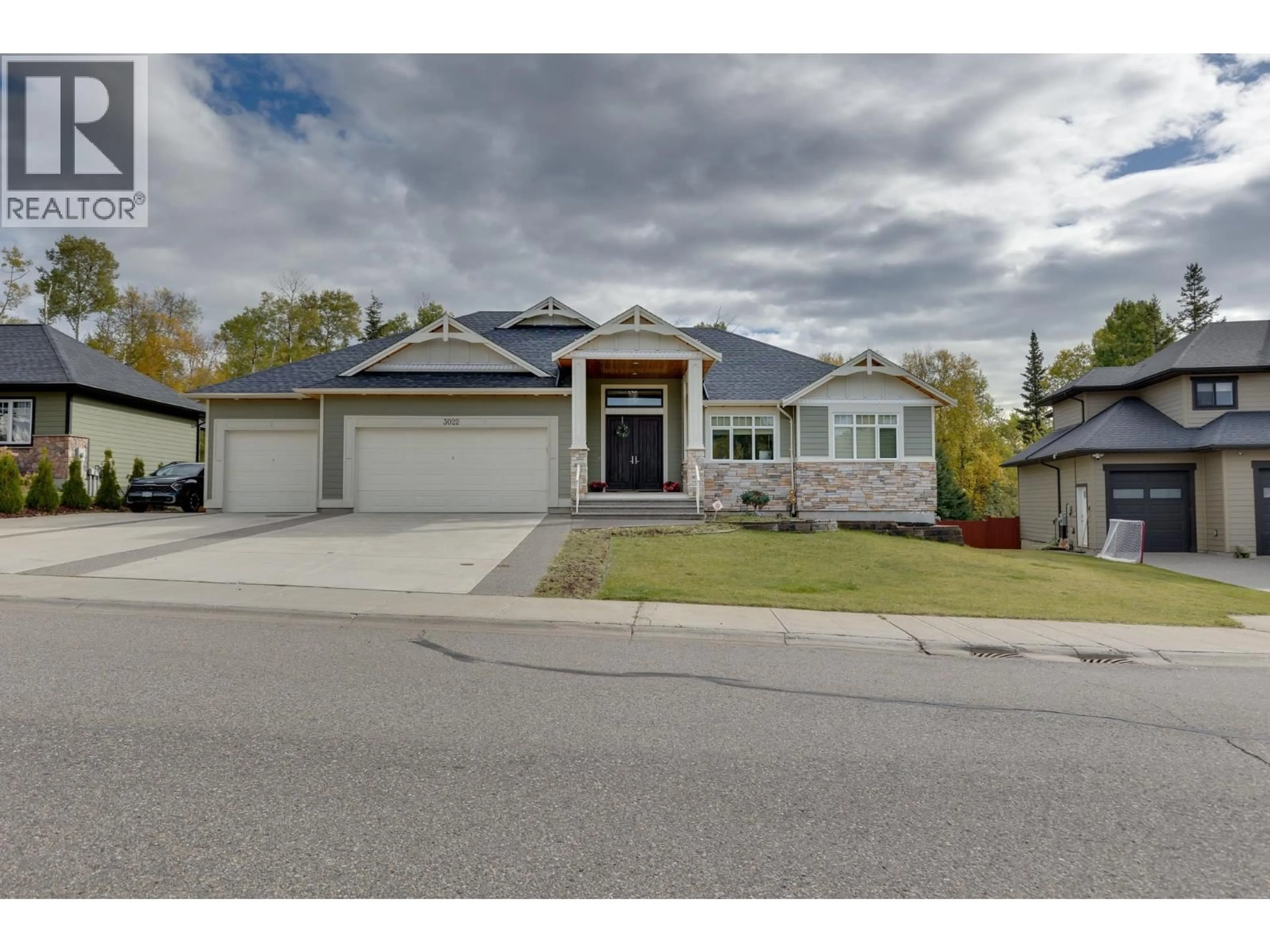 Home with brick exterior material, street for 3022 MAURICE DRIVE, Prince George British Columbia V2N0C8