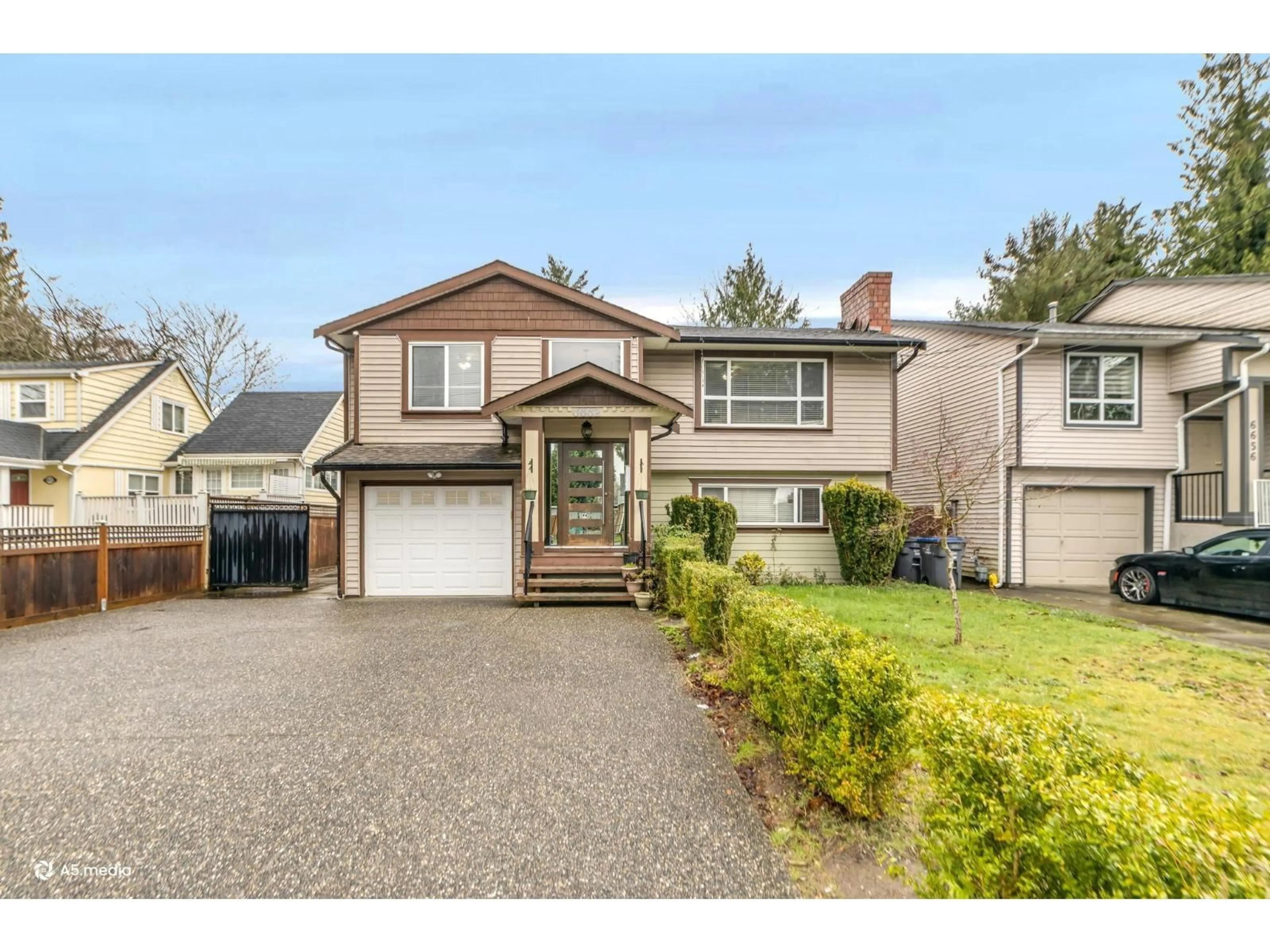 Home with vinyl exterior material, street for 6662 130 STREET, Surrey British Columbia V3W4J3