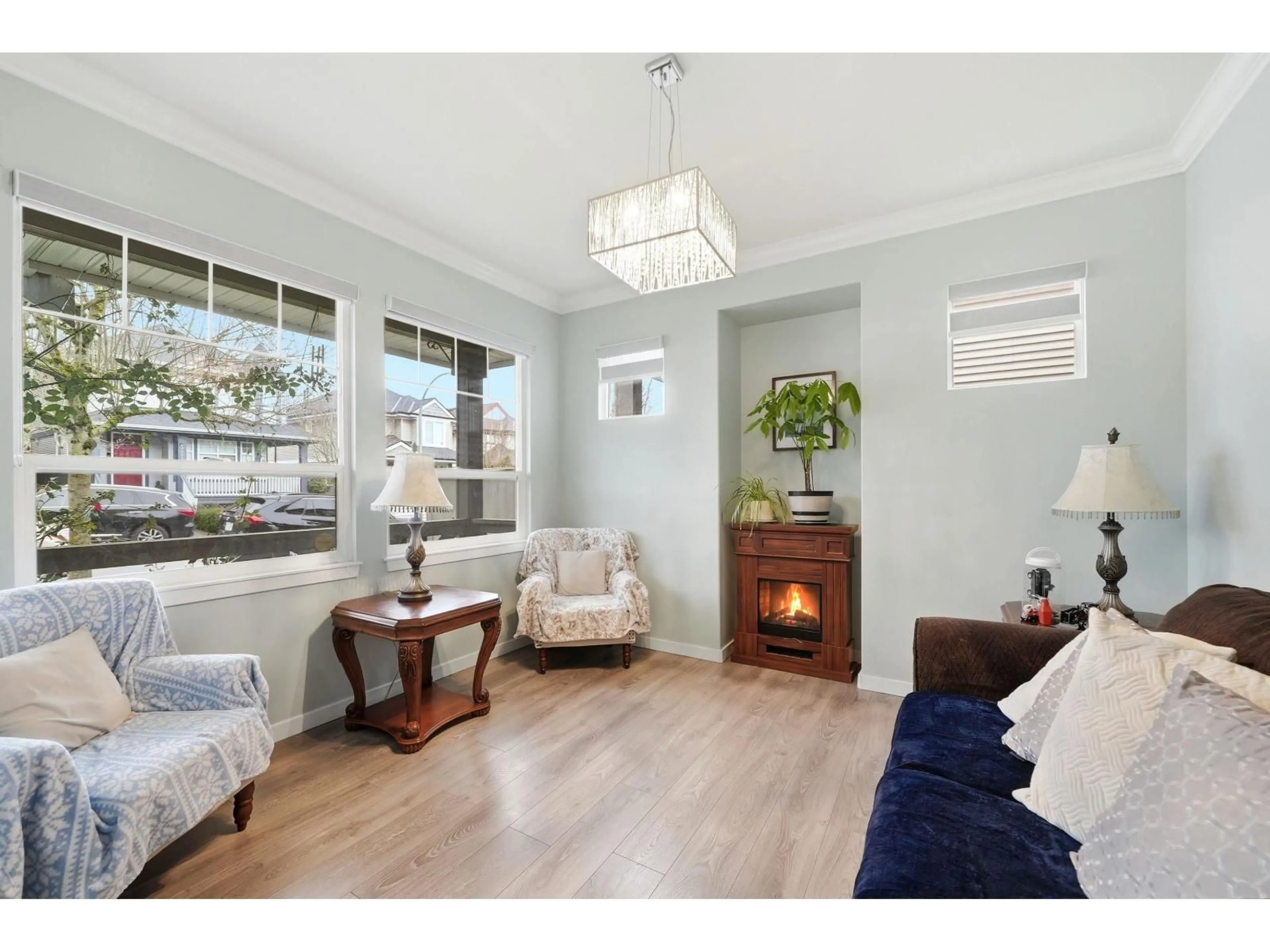 Living room with furniture, wood/laminate floor for 14858 56A AVENUE, Surrey British Columbia V3S8X1