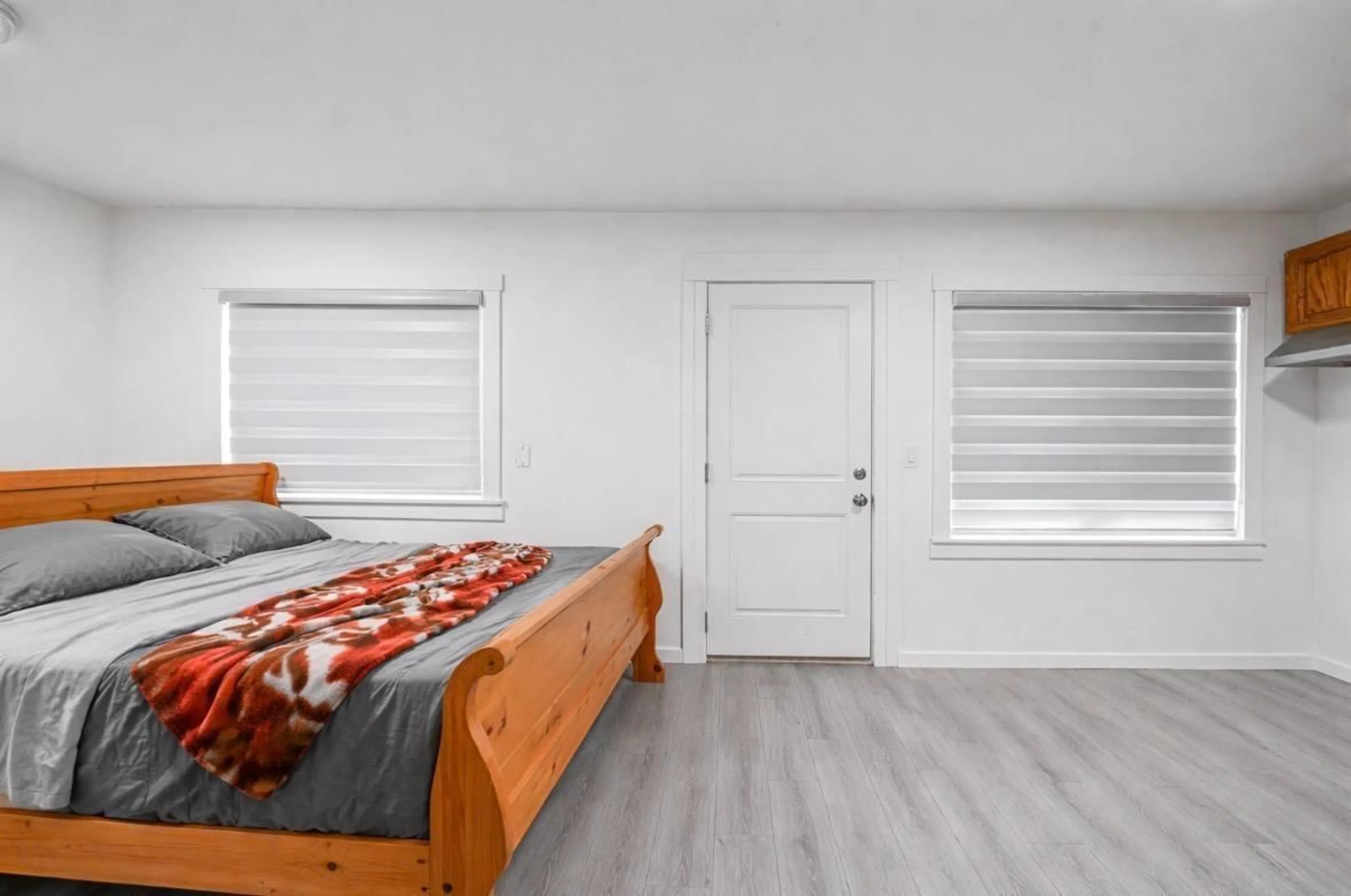 Bedroom with bed, wood/laminate floor for 12729 114A AVENUE, Surrey British Columbia V3V3P3