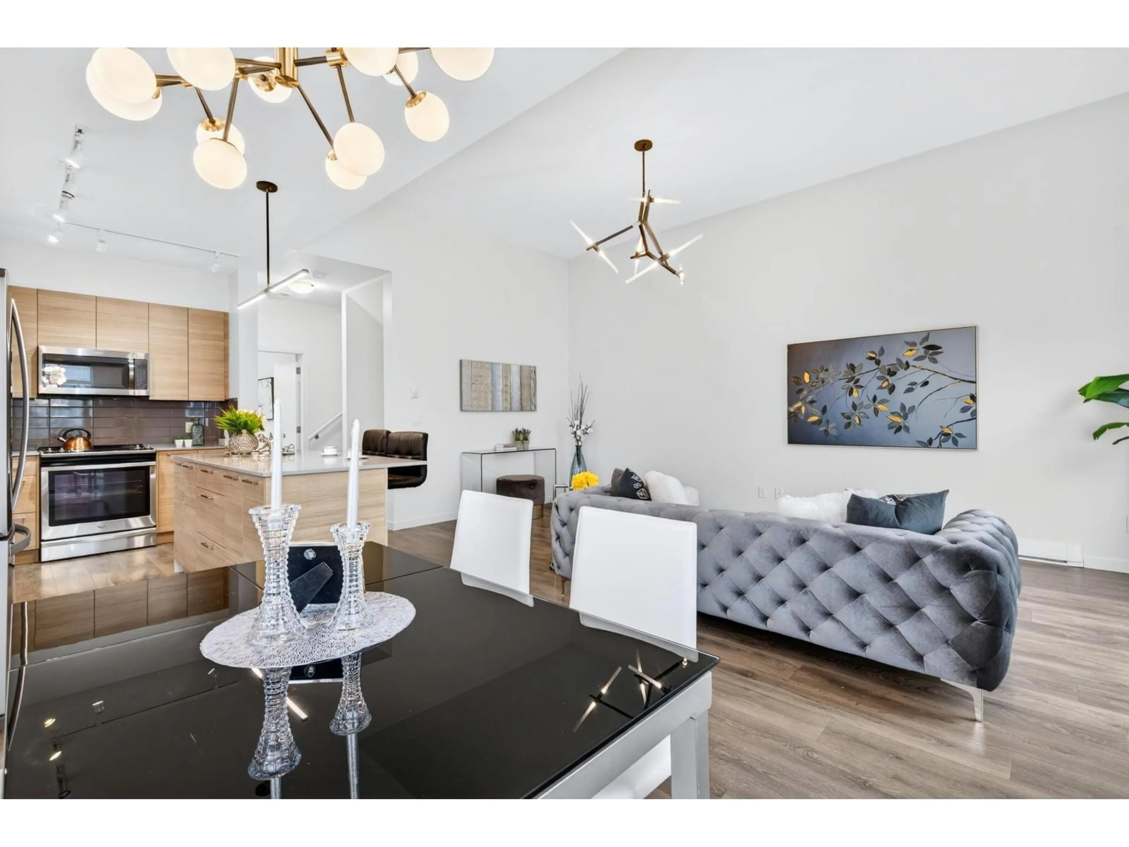 Open concept kitchen, wood/laminate floor for 1405 - 18505 LAURENSEN PLACE, Surrey British Columbia V4N6R7