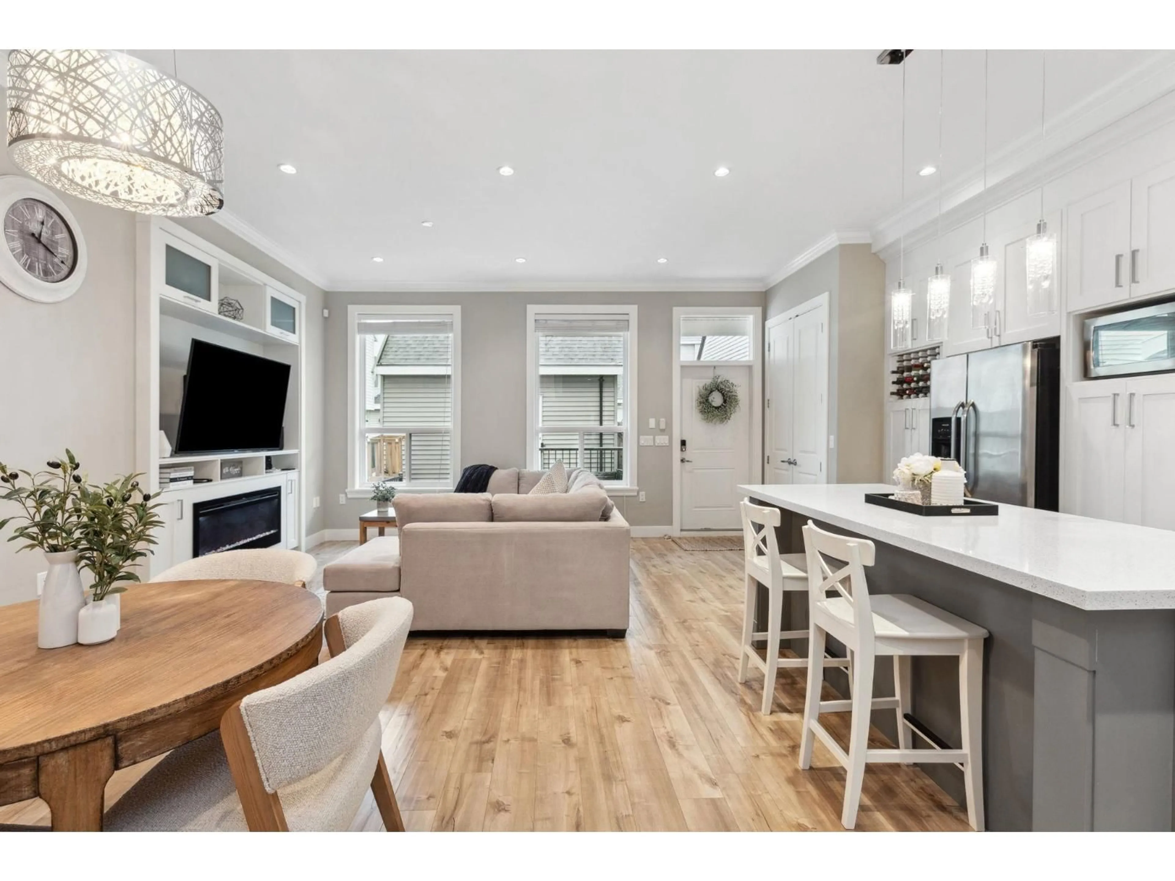 Open concept kitchen, wood/laminate floor for 5926 139A STREET, Surrey British Columbia V3X0G6