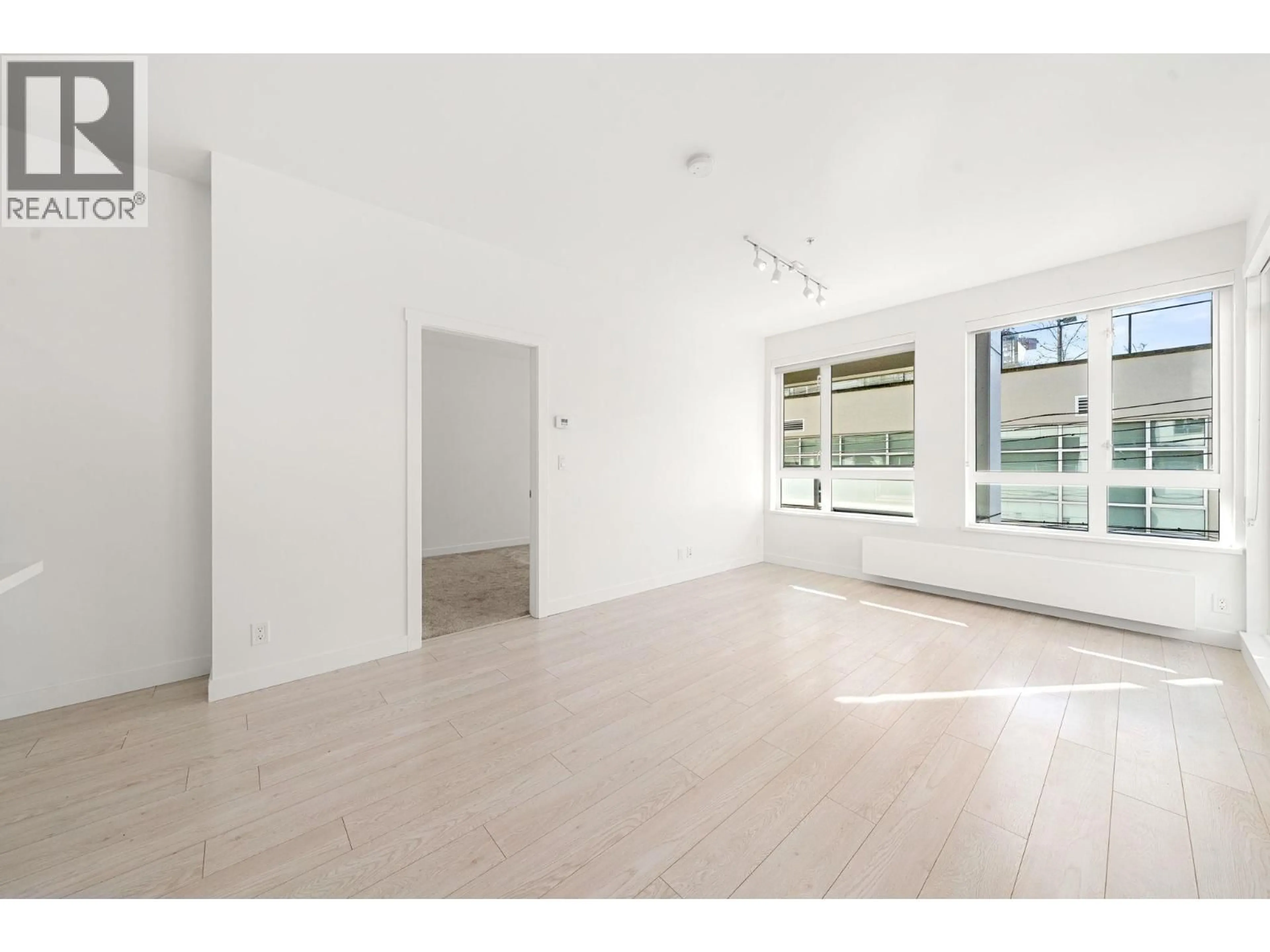 A pic of a room for 208 - 711 14TH STREET, North Vancouver British Columbia V7M3E8